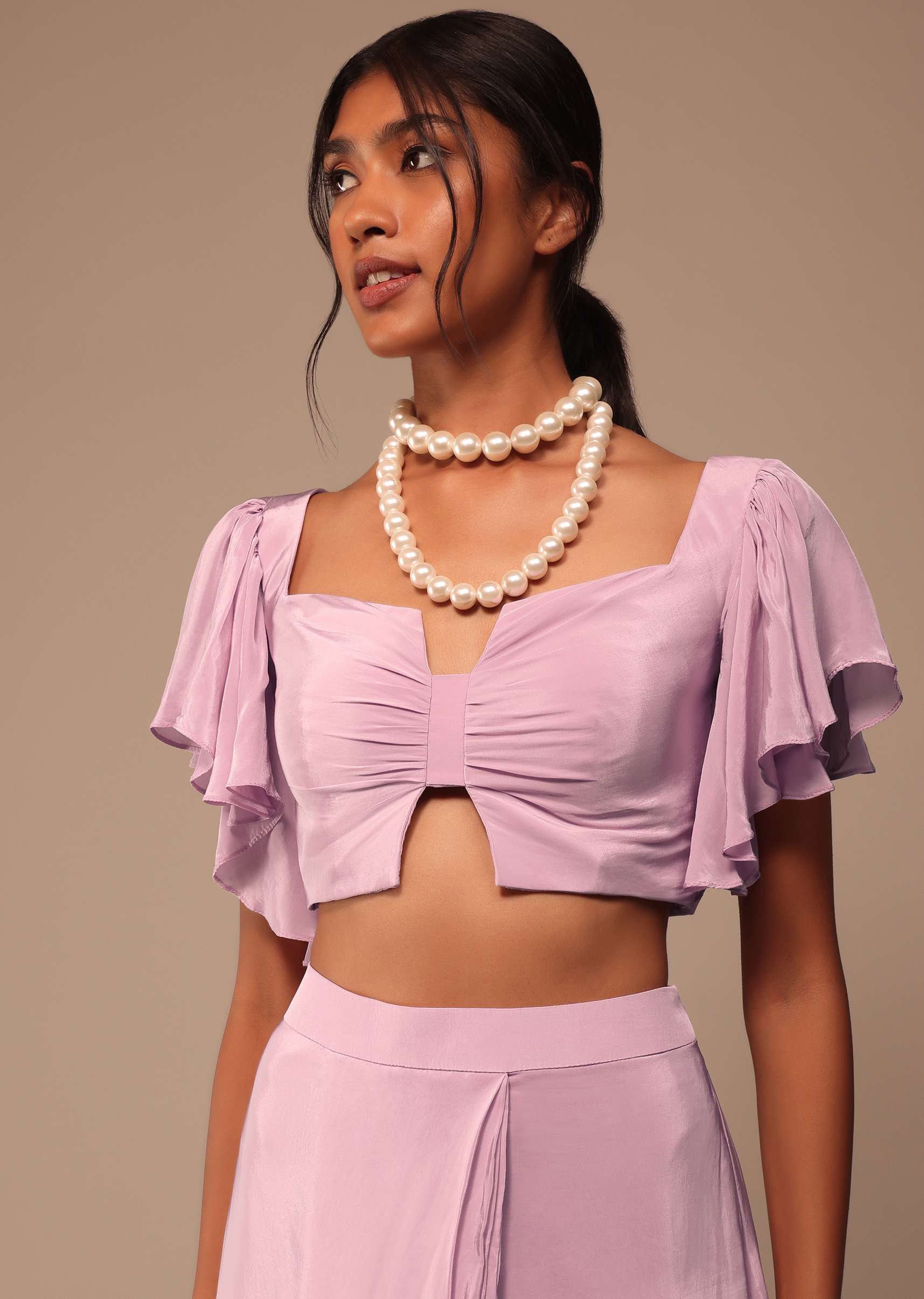 Baby Pink Crepe Saree With Fancy Bow Shaped Blouse And Belt - Image 2