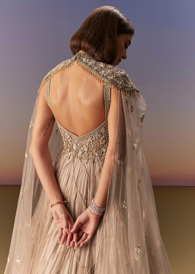 Beige Gown With Shoulder Cape And Rich Vertical Embroidery - Image 6