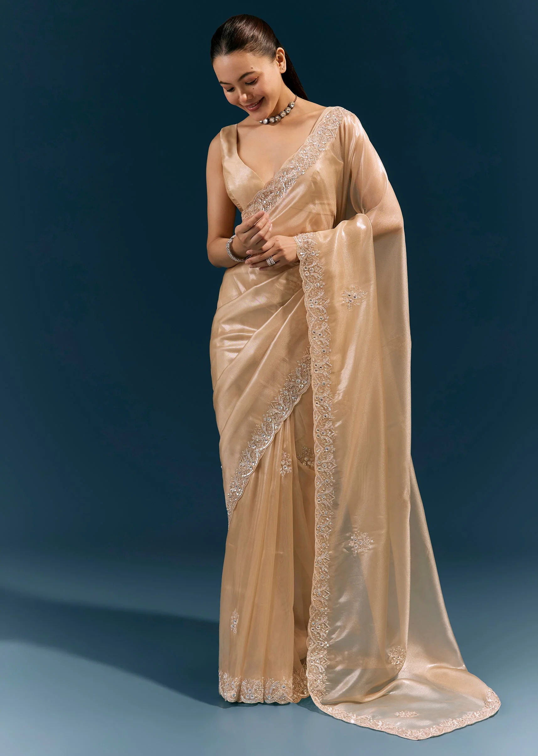 Beige Net Saree With Scalloped Cutda And Sequin Embroidered Border