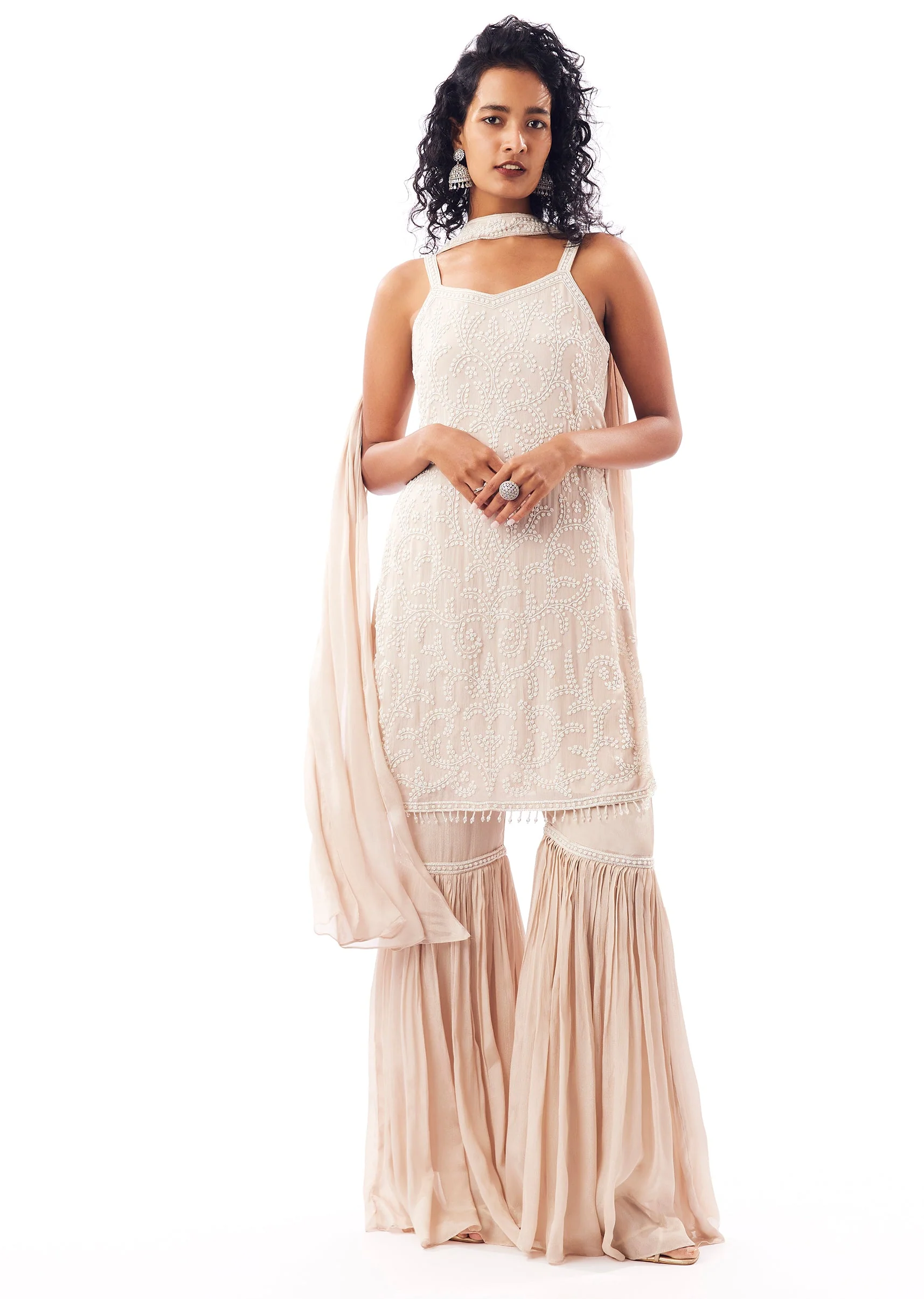 Beige Sweetheart Neck Sharara Set With Cutdana And Moti Shine.