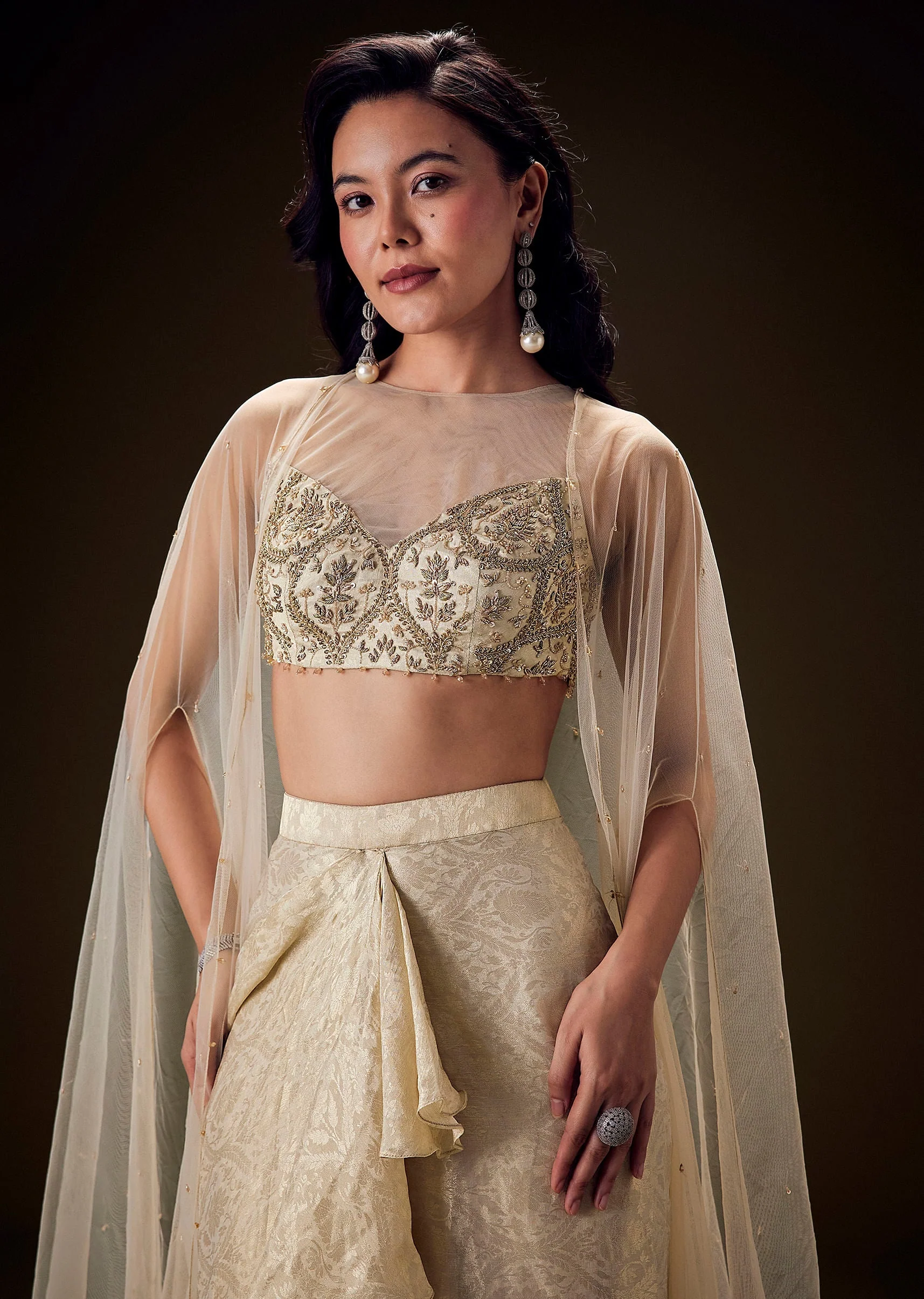 Beige Zardozi Embroidered Blouse With Brocade Drape Skirt And Net Cape - Image 3