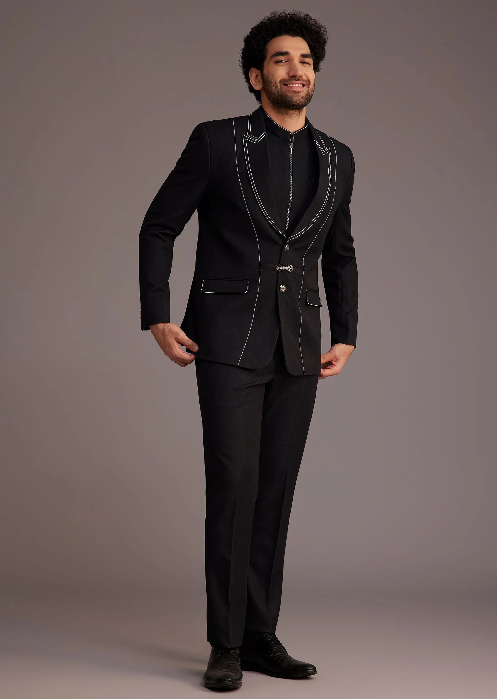 Black Suit With White Piping And Chain Detail - Image 4
