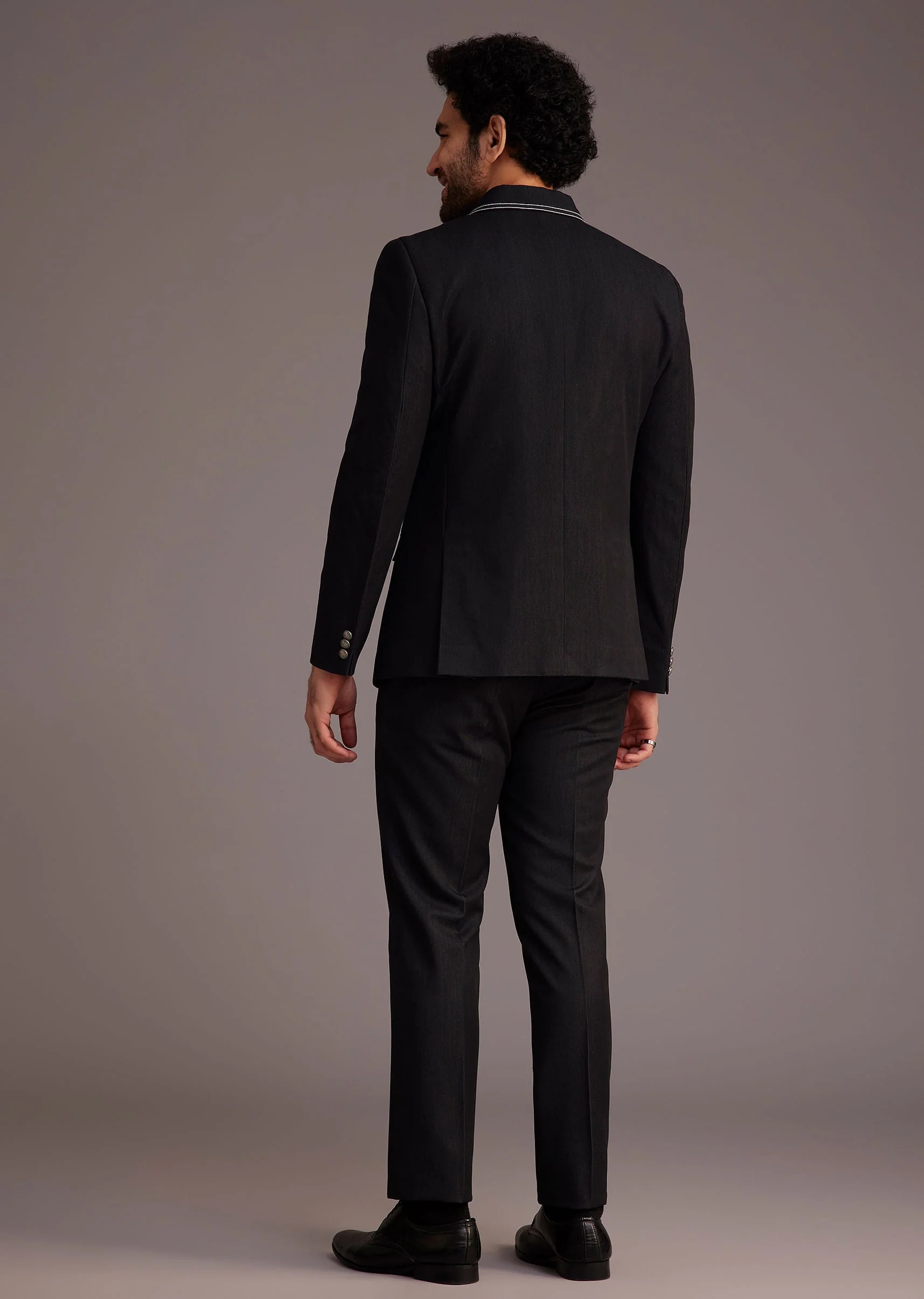 Black Suit With White Piping And Chain Detail - Image 7