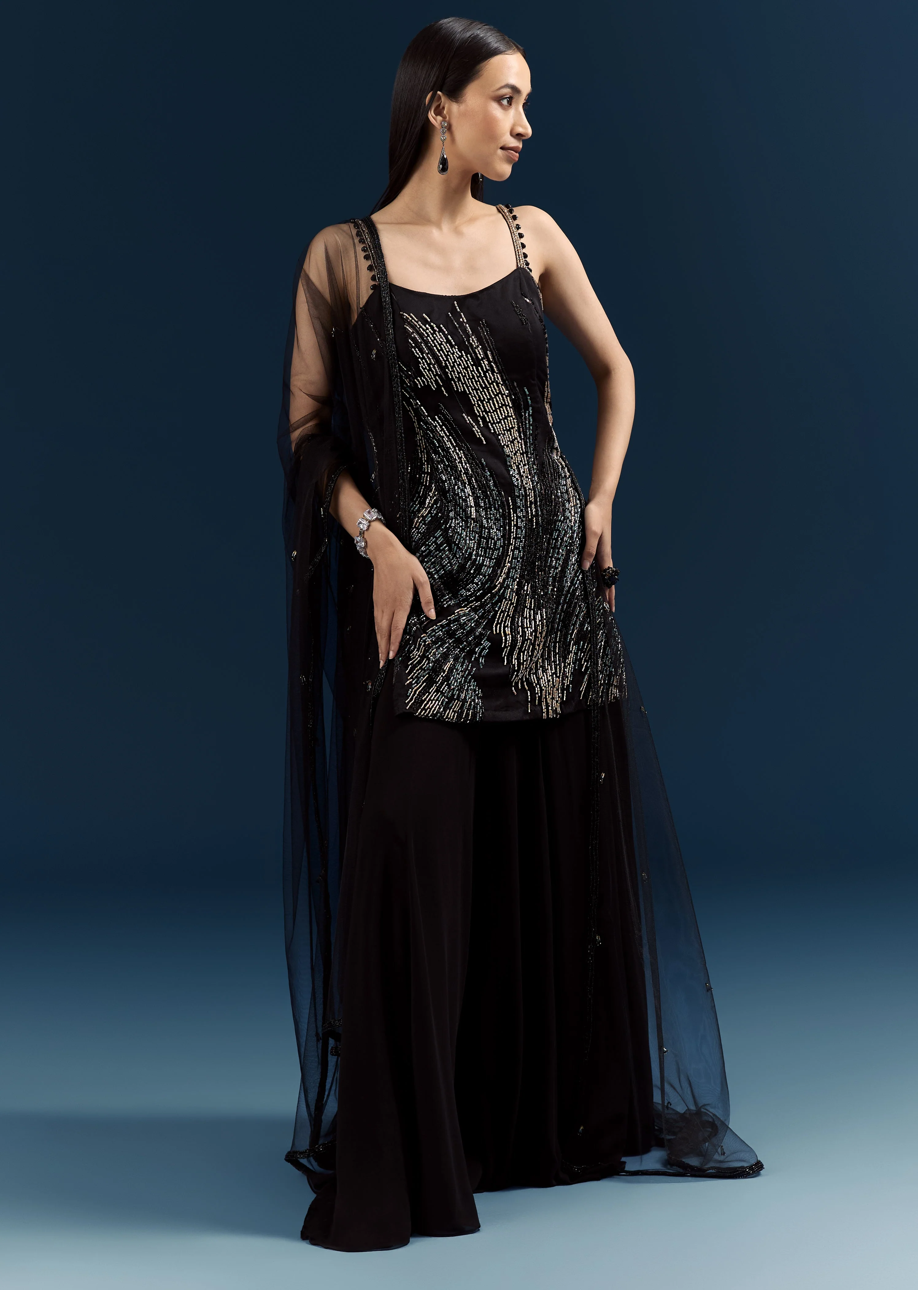 Black Tie Evening Glamour Couple Set – Black Sequins Sharara Suit with Cutdana Embroidery for Her And Black Jacquard Indo-Western Set with Embroidered Stole for Him - Image 3
