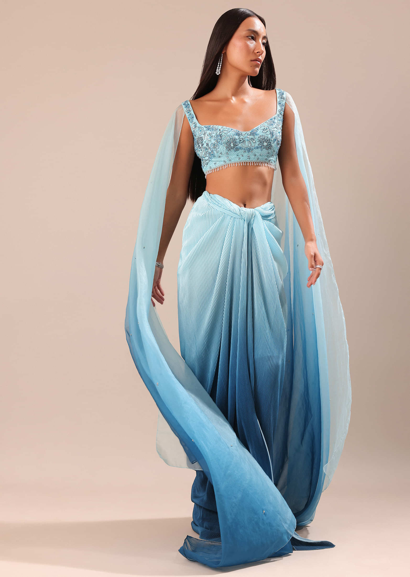 Blue Pre Pleated Twisted Skirt And Blouse With Attched Cape - Image 4