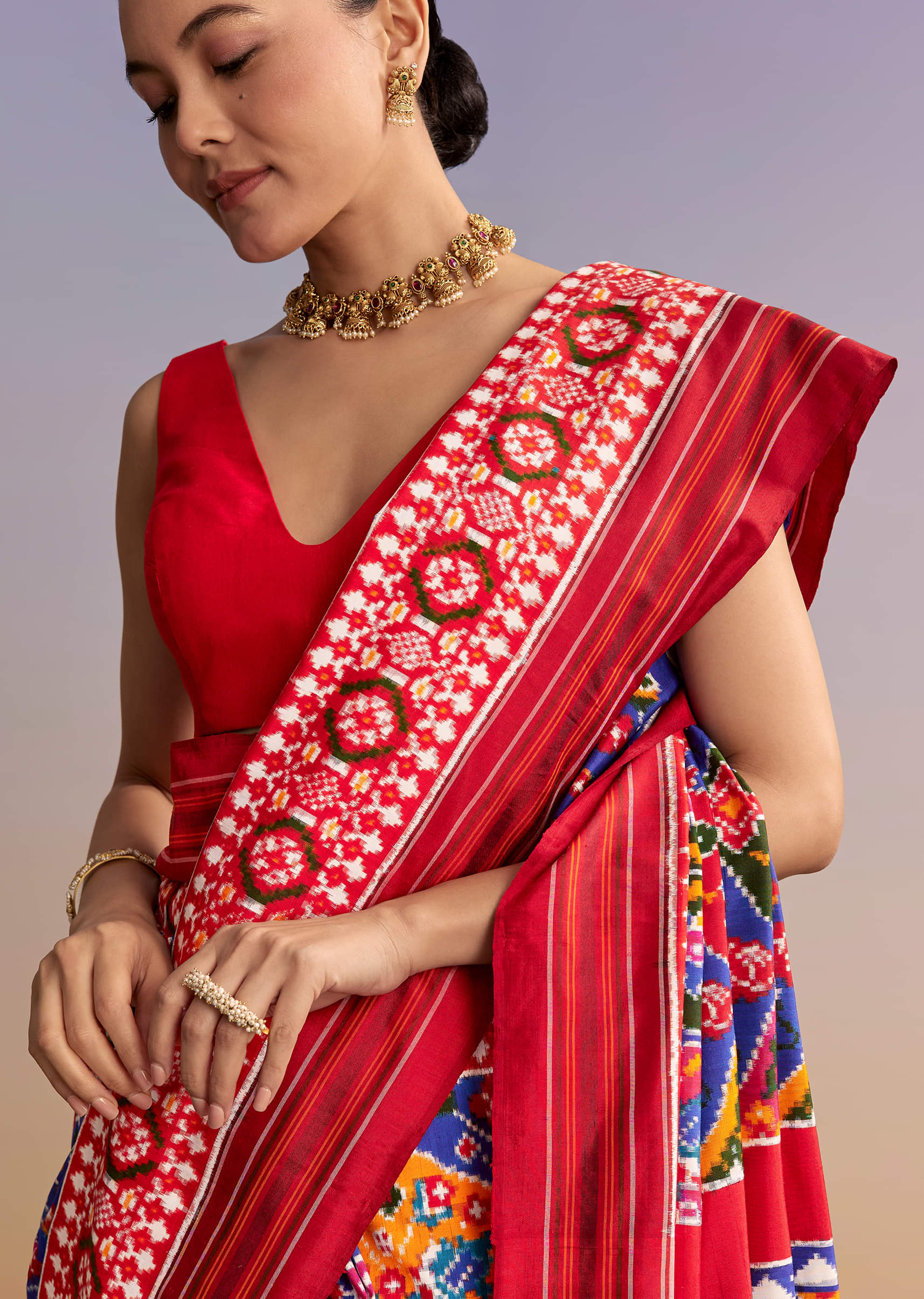 Blue Silk Double Ikkat Handwoven Patola Saree With Floral Motifs - Image 2
