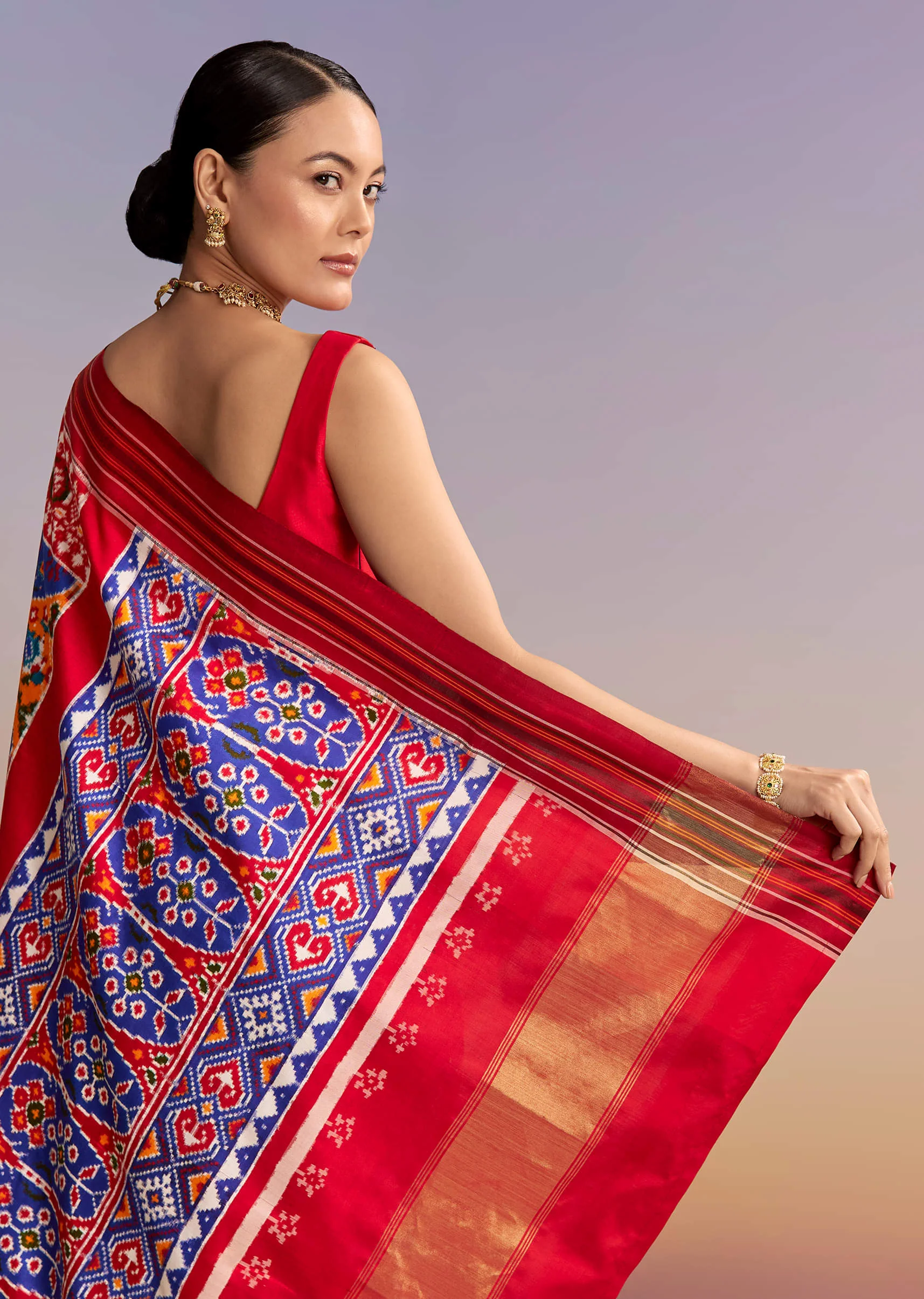 Blue Silk Double Ikkat Handwoven Patola Saree With Floral Motifs - Image 6