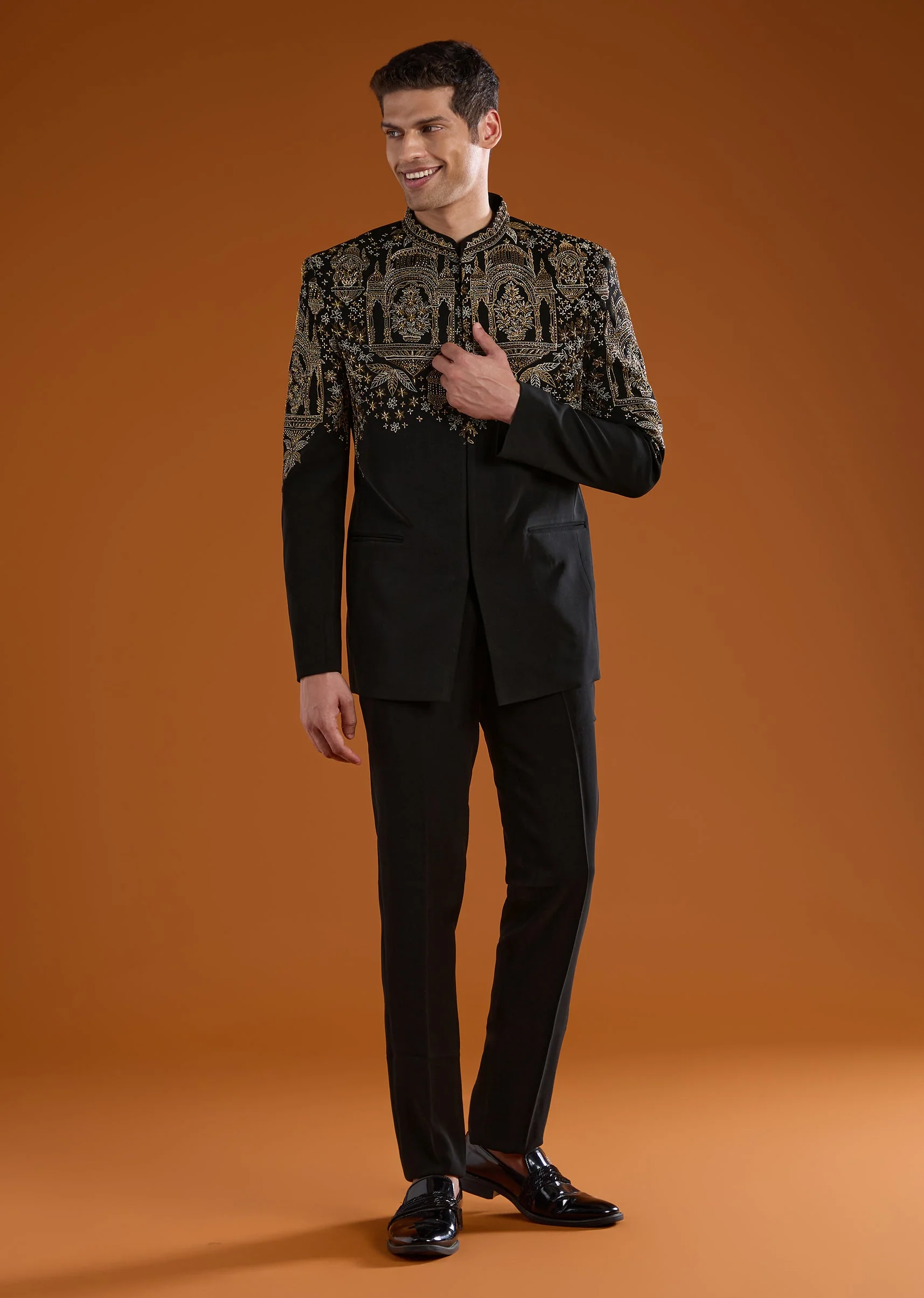 Bold Festive Couple Set – Black Silk Palazzo Suit With Zari Thread And Sequins Work For Her And Black Suiting Jodhpuri Pant Set With Embroidery For Him - Image 7