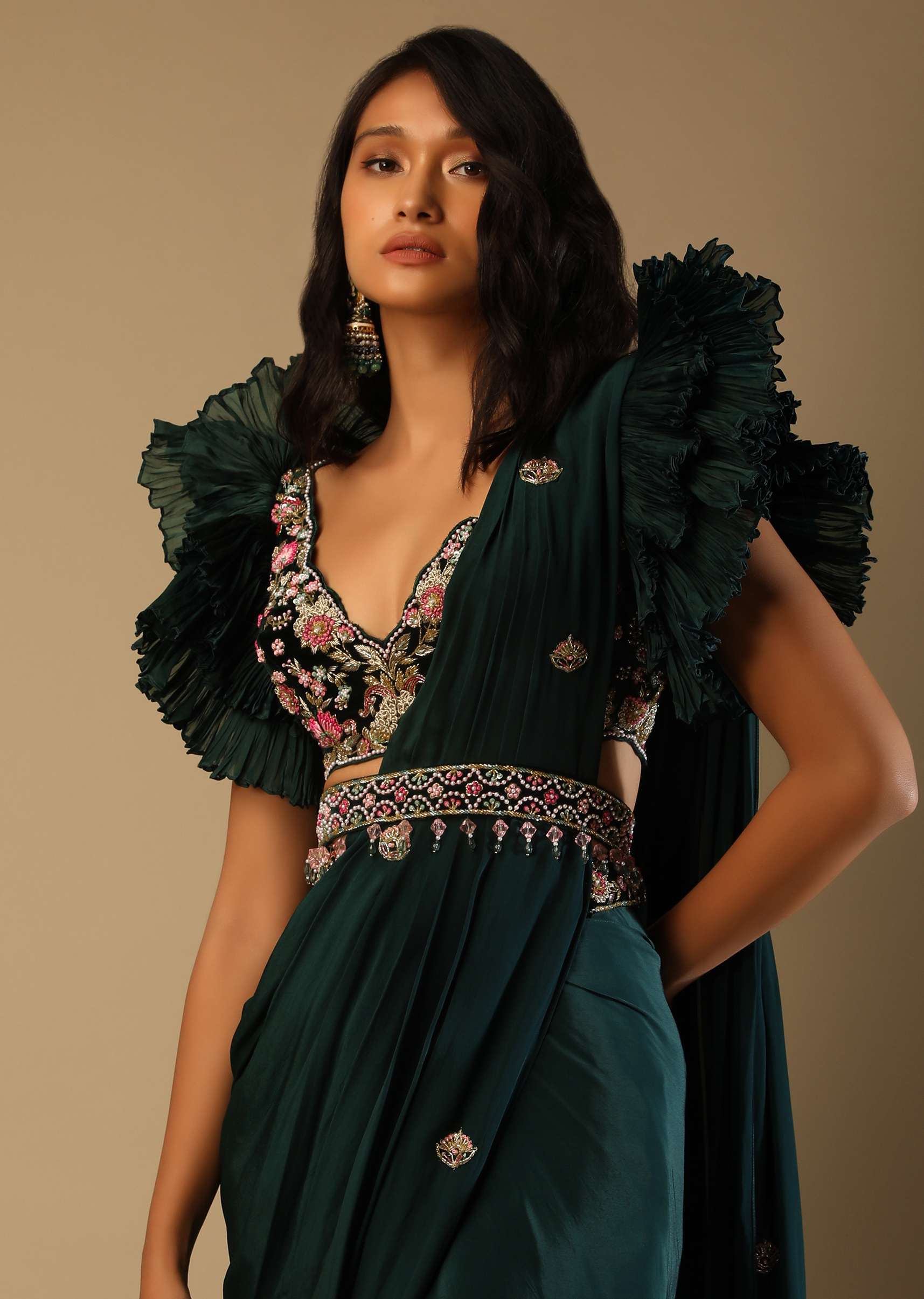 Bottle Green Ready Pleated Saree With A Colorful Hand Embroidered Blouse With Fancy Layered Frill Sleeves - Image 3