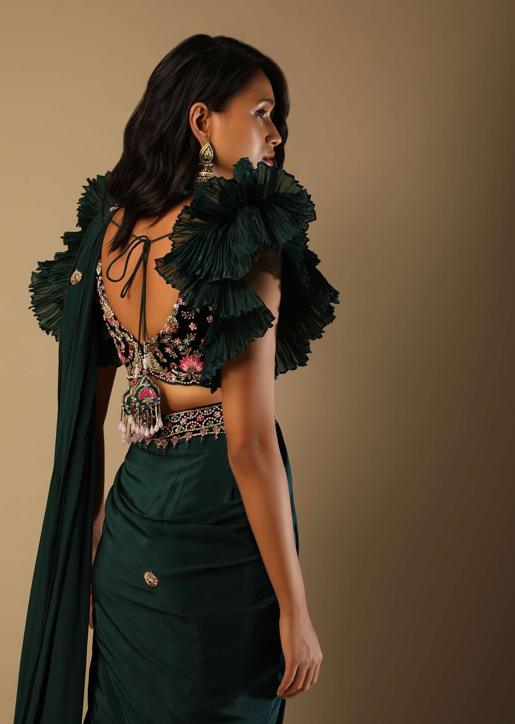 Bottle Green Ready Pleated Saree With A Colorful Hand Embroidered Blouse With Fancy Layered Frill Sleeves - Image 4