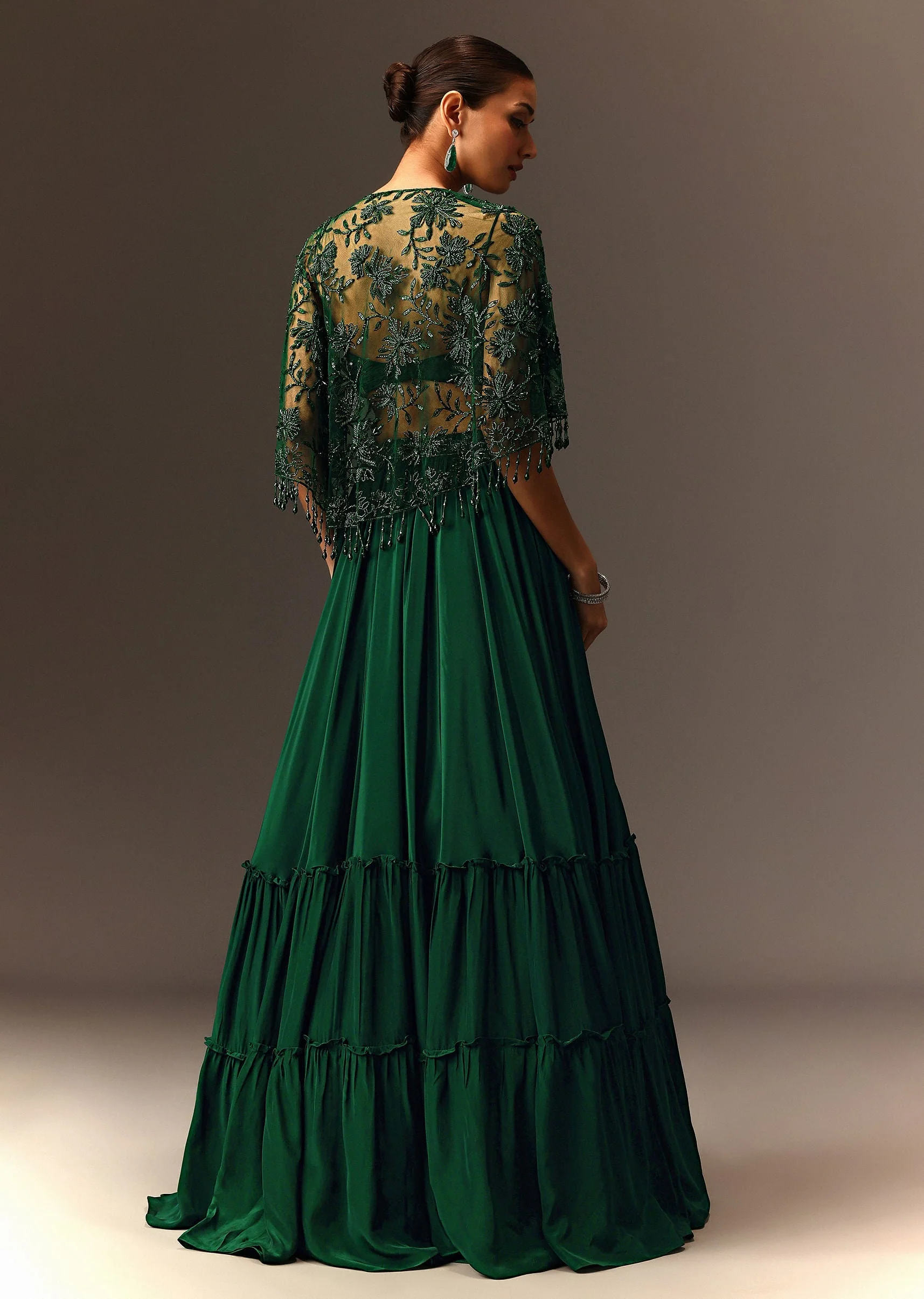 Bottle Green Tiered Lehenga With Net Cape - Image 6