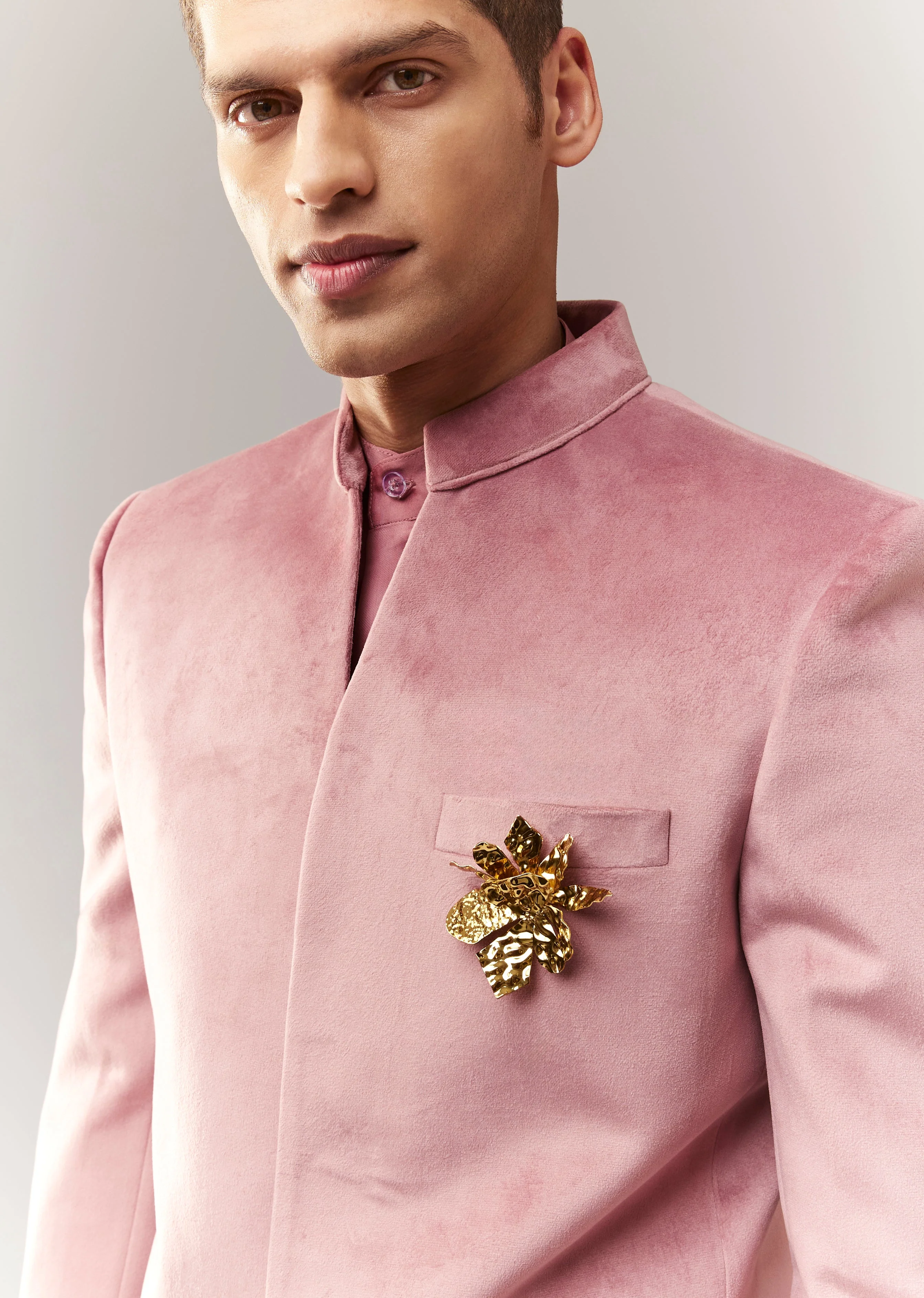 Celebration Couple Set – Blush Pink Georgette Fish-Cut Lehenga with Embroidered Sleeveless Blouse & Choker Dupatta for Her And Pink Jodhpuri-Style Tuxedo Set with Metal Broach for Him - Image 6