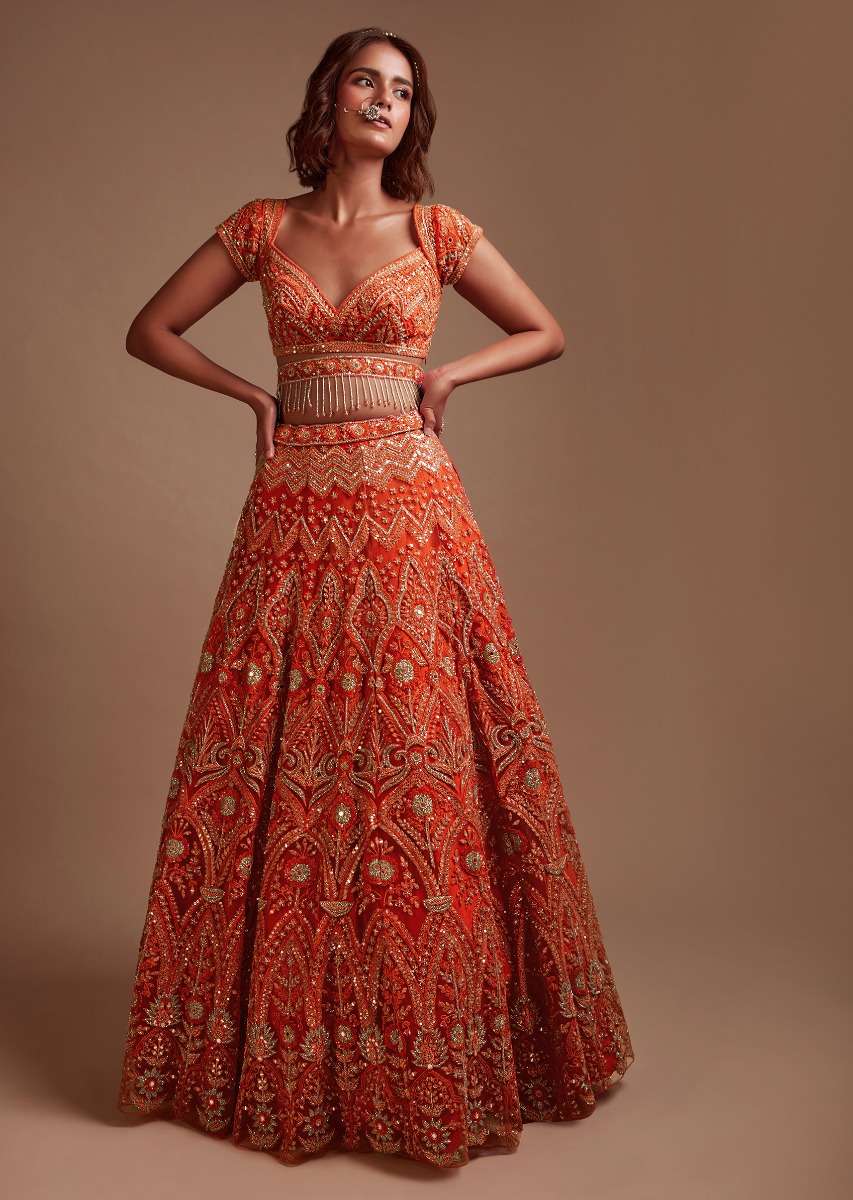 Coral Orange Lehenga Choli In Net With Mirror And Sequins Embroidered Floral And Mughal Embroidery Along With Belt Detailing - Image 6