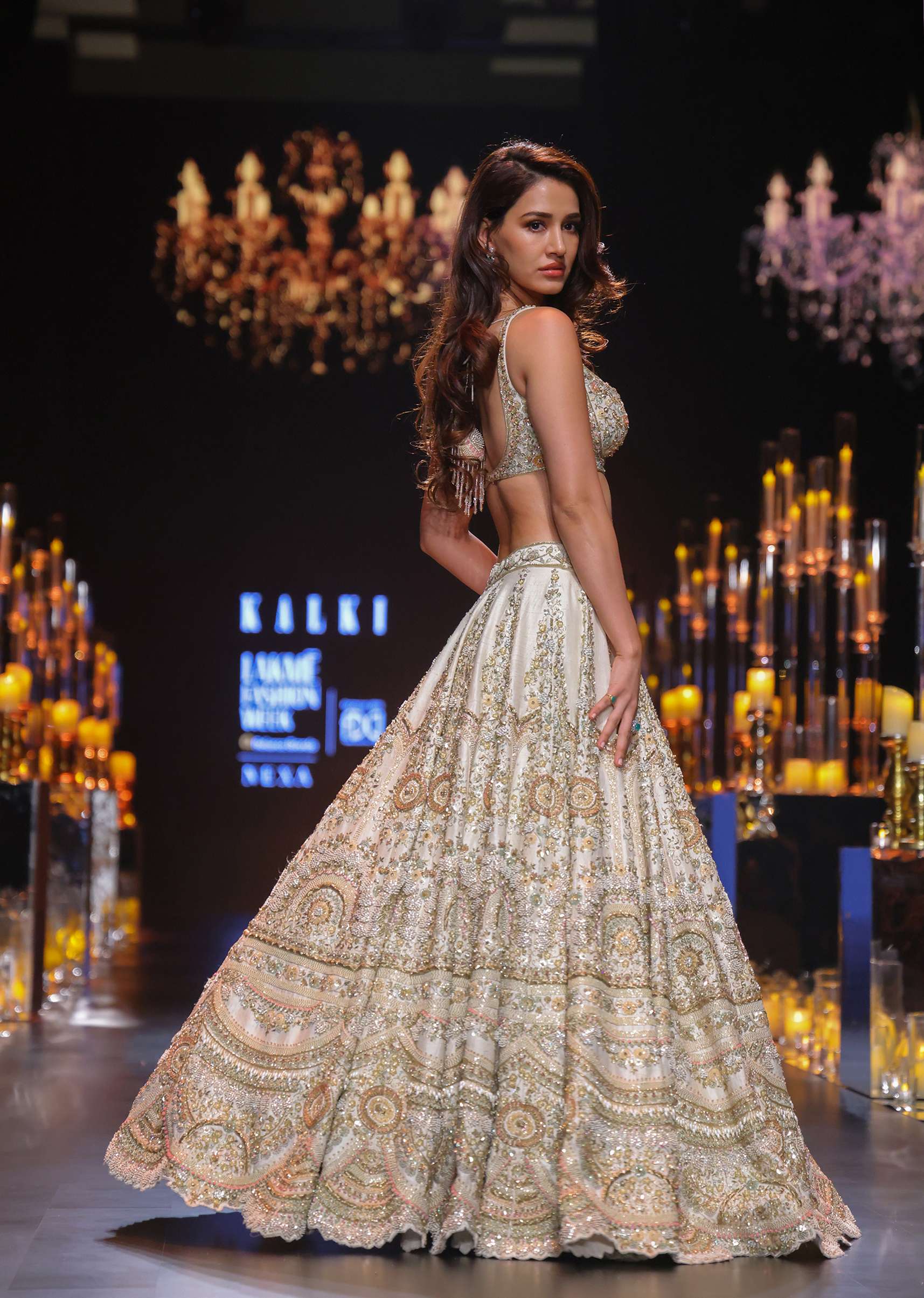 Disha Patani In Peach Lehenga Set with Pearl Butti Embroidery And 3D Flowers - Image 3