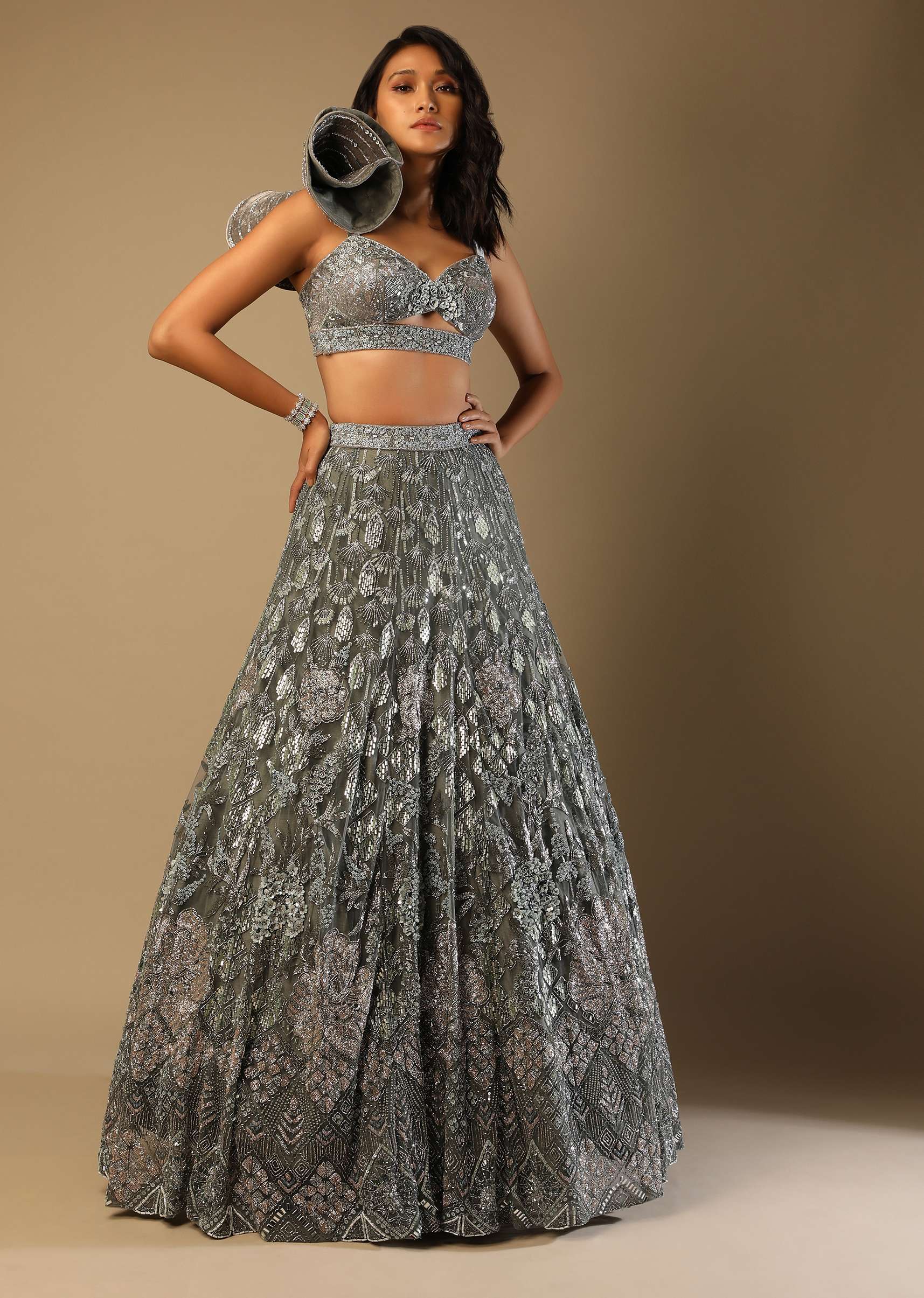 Fern Green Lehenga Choli In Net With Stone Hand Embroidered Floral Motifs And Fancy Origami Cones On The Shoulder - Image 4