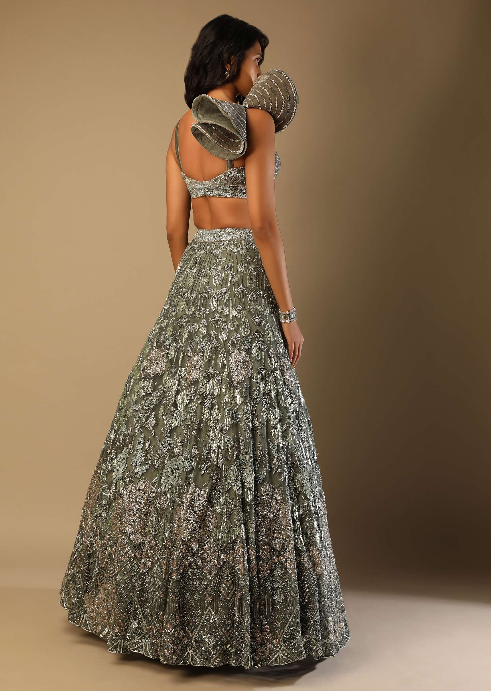 Fern Green Lehenga Choli In Net With Stone Hand Embroidered Floral Motifs And Fancy Origami Cones On The Shoulder - Image 6
