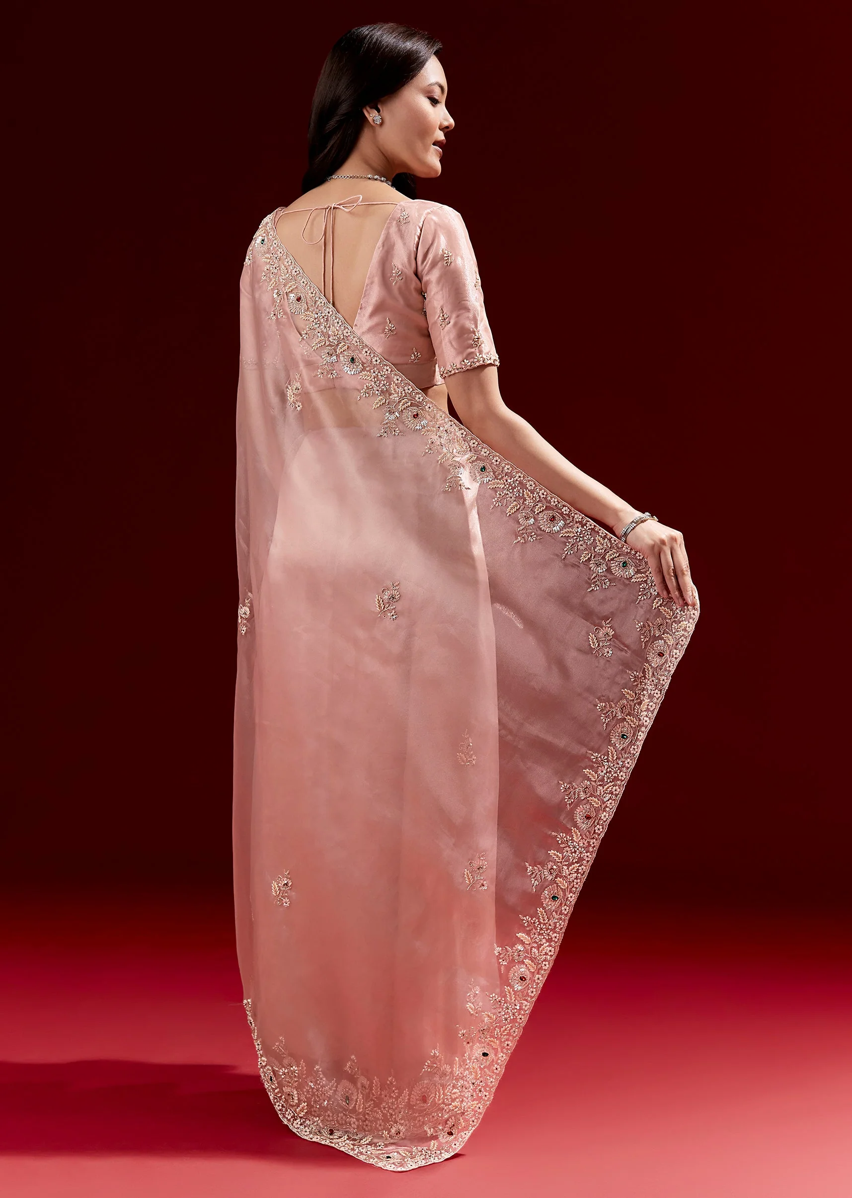 Glossy Peach Tissue Saree With Heavy Embroidered Scalloped Border And Stone Highlights - Image 4