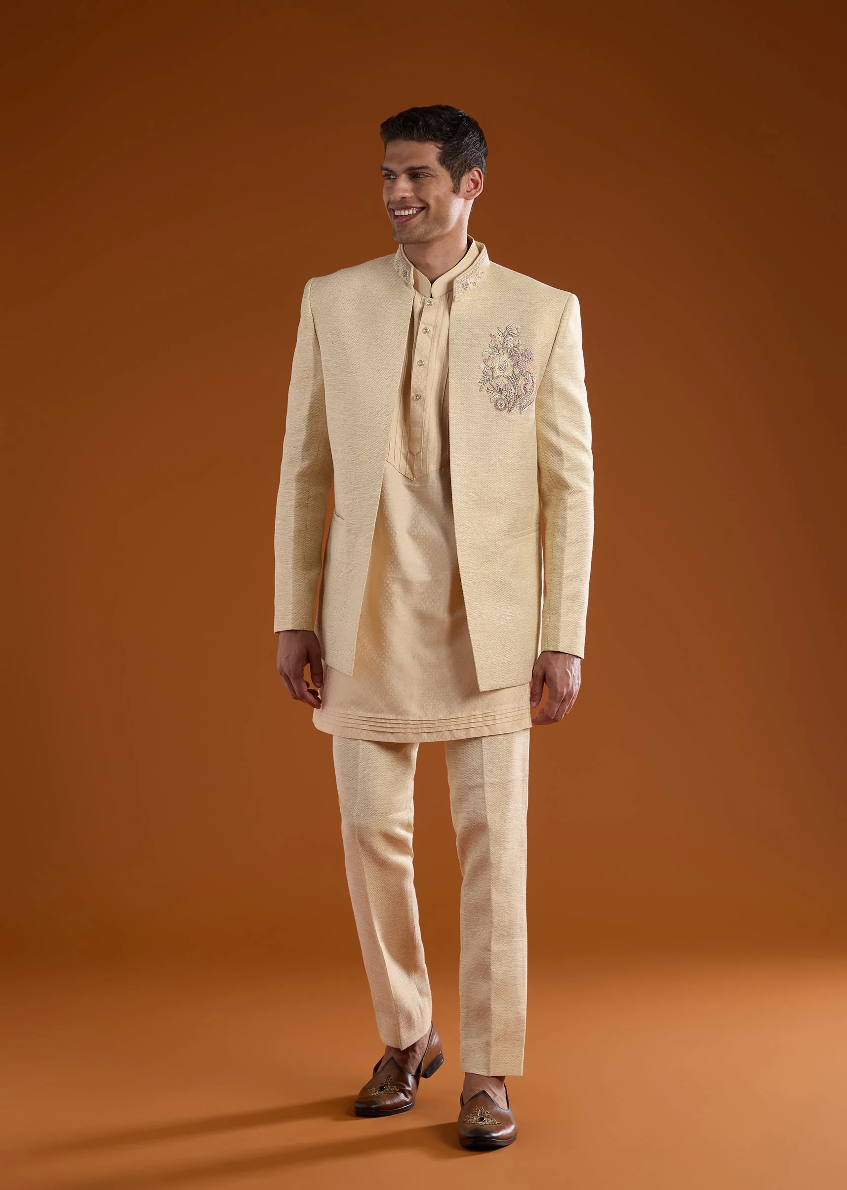 Gold Celebration Duo – Jumpsuit With Jacket For Her And Embellished Jodhpuri Kurta Set For Him - Image 8