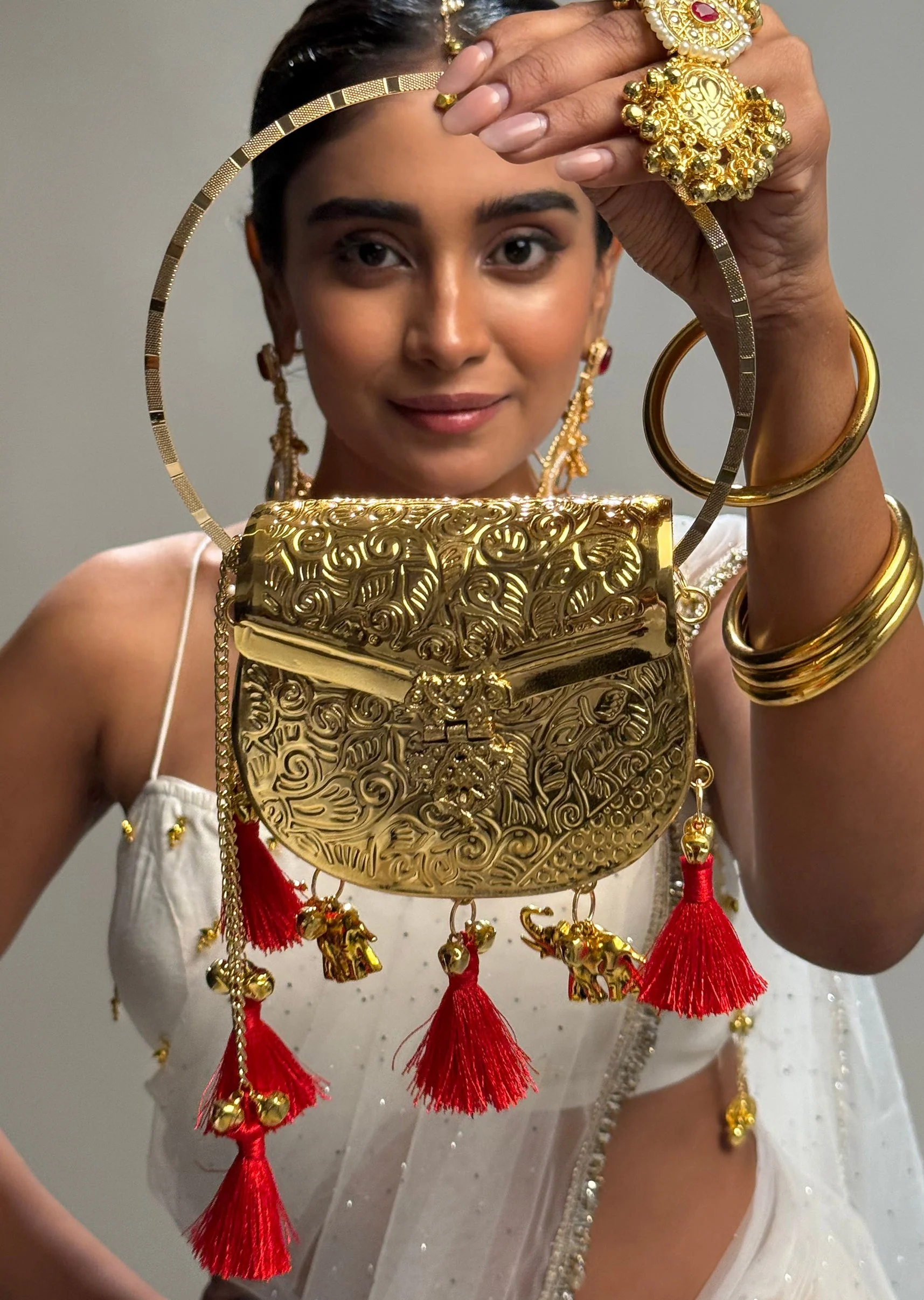 Gold Elephant Motif Potli Bag