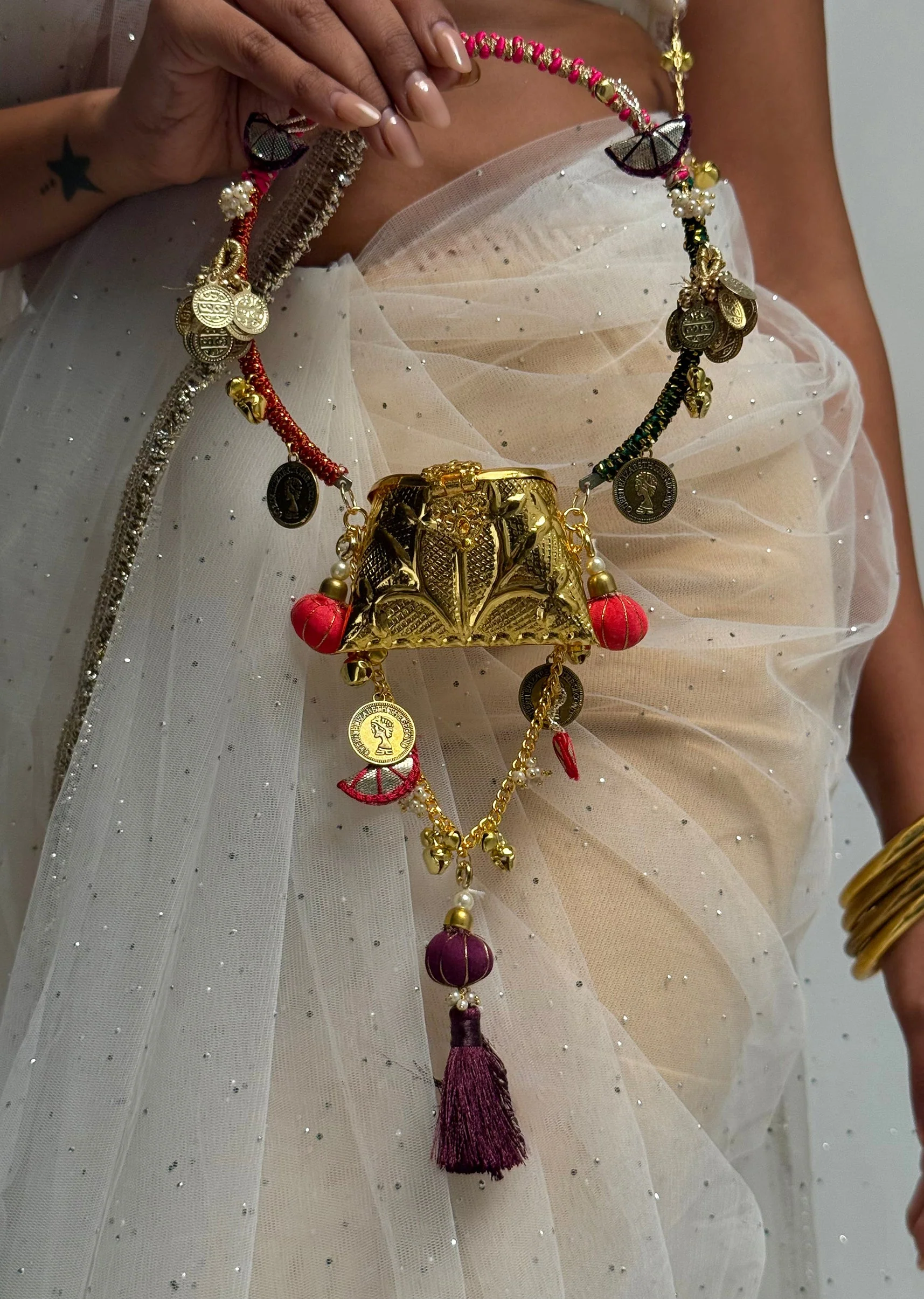 Gold Embossed Multicolour Potli Bag