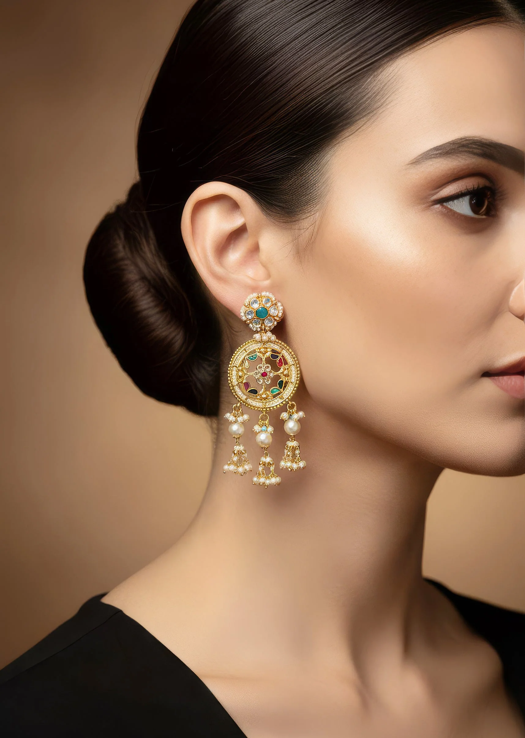 Gold Finish Earrings With Traditional Temple Motifs And Green Purple Red Yellow and Blue Simulated Stones And Faux Pearls.