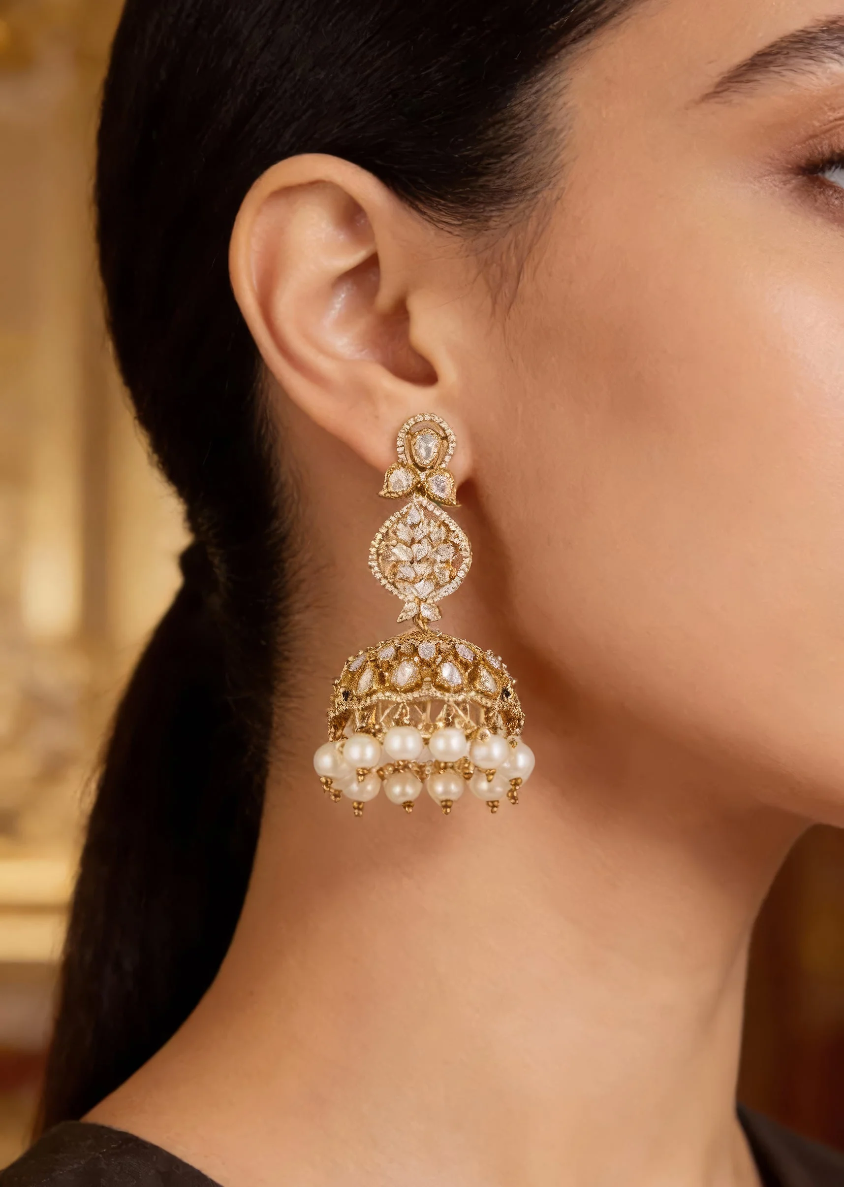 Gold Finish Jhumkas In Polki With Off White Simulated Pearls and Clear Polki Style Stones