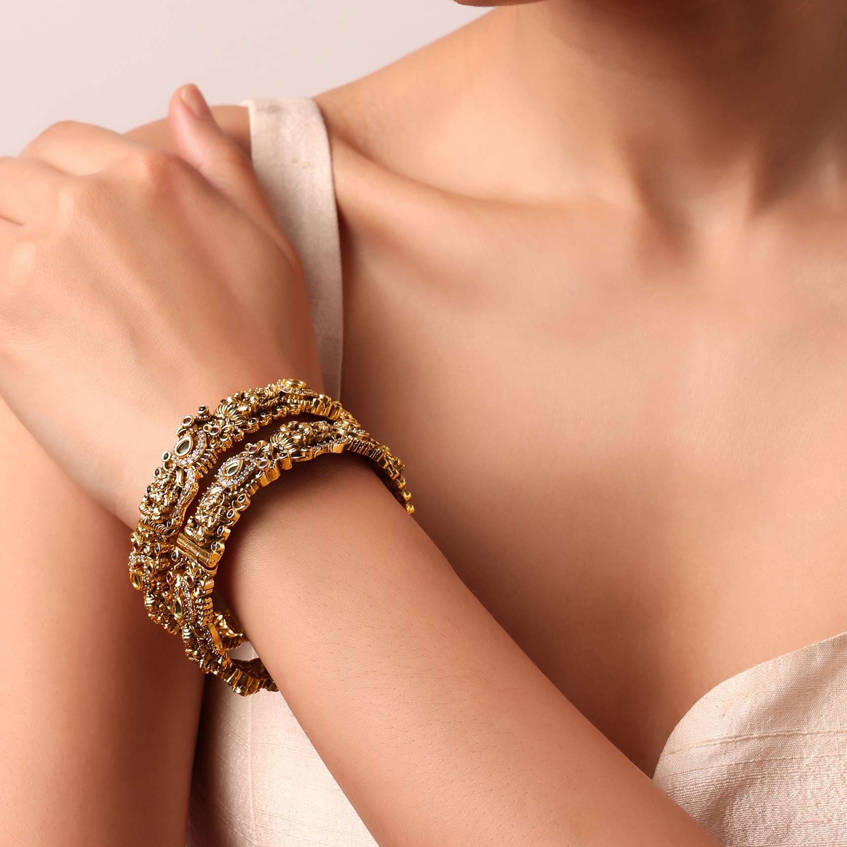 Gold Finish Multi Carved Bangle With Studded Kundan And Motifs Set of 2 - Image 2