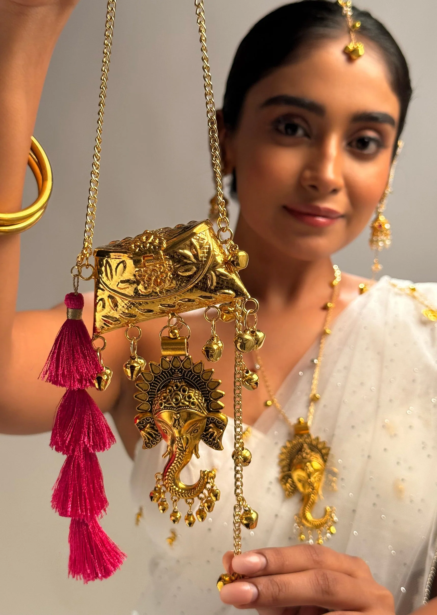 Gold Ganesha Charm Potli Bag