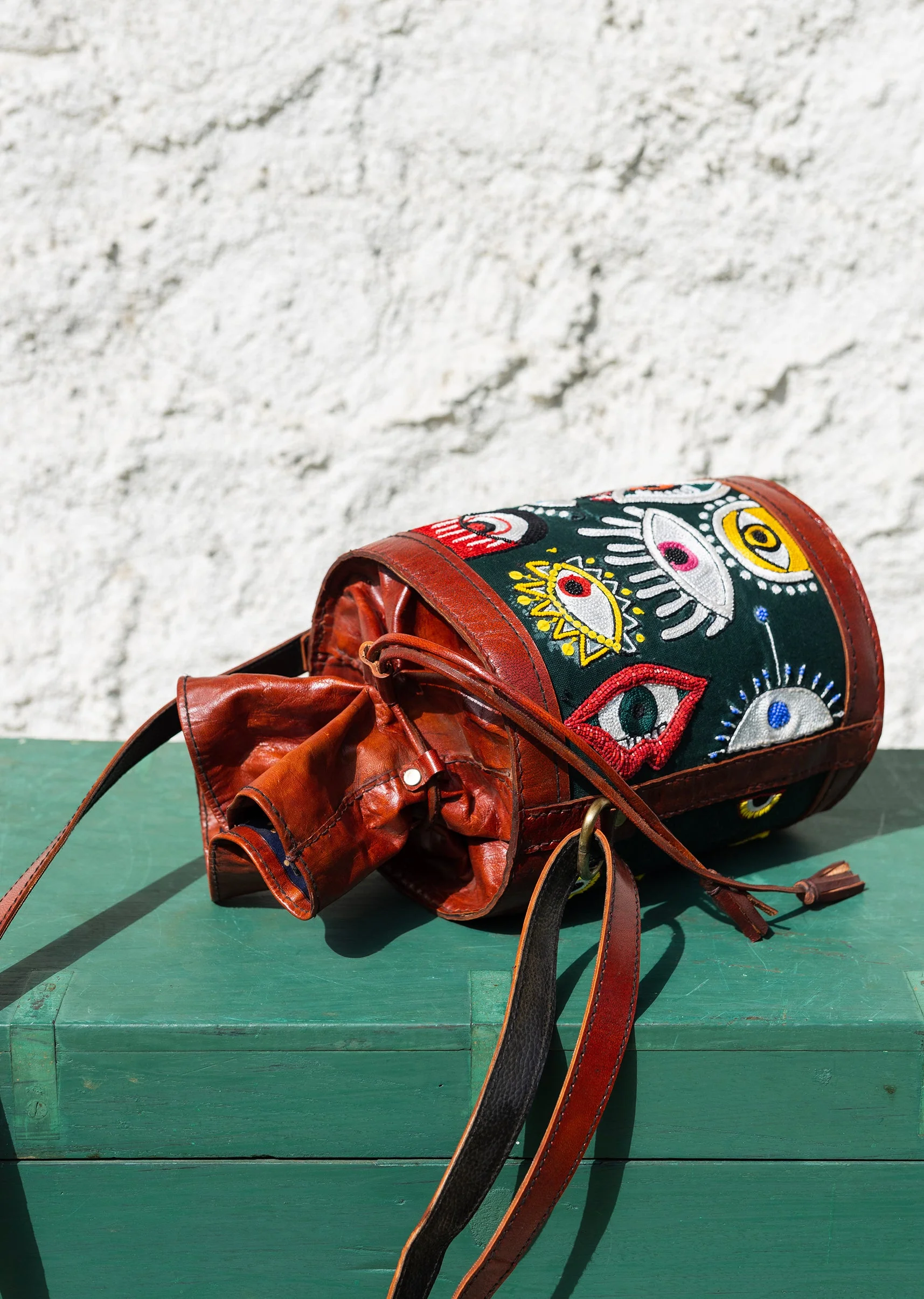 Handcrafted leather potli bag with bold colourful eye embroidery - Image 4