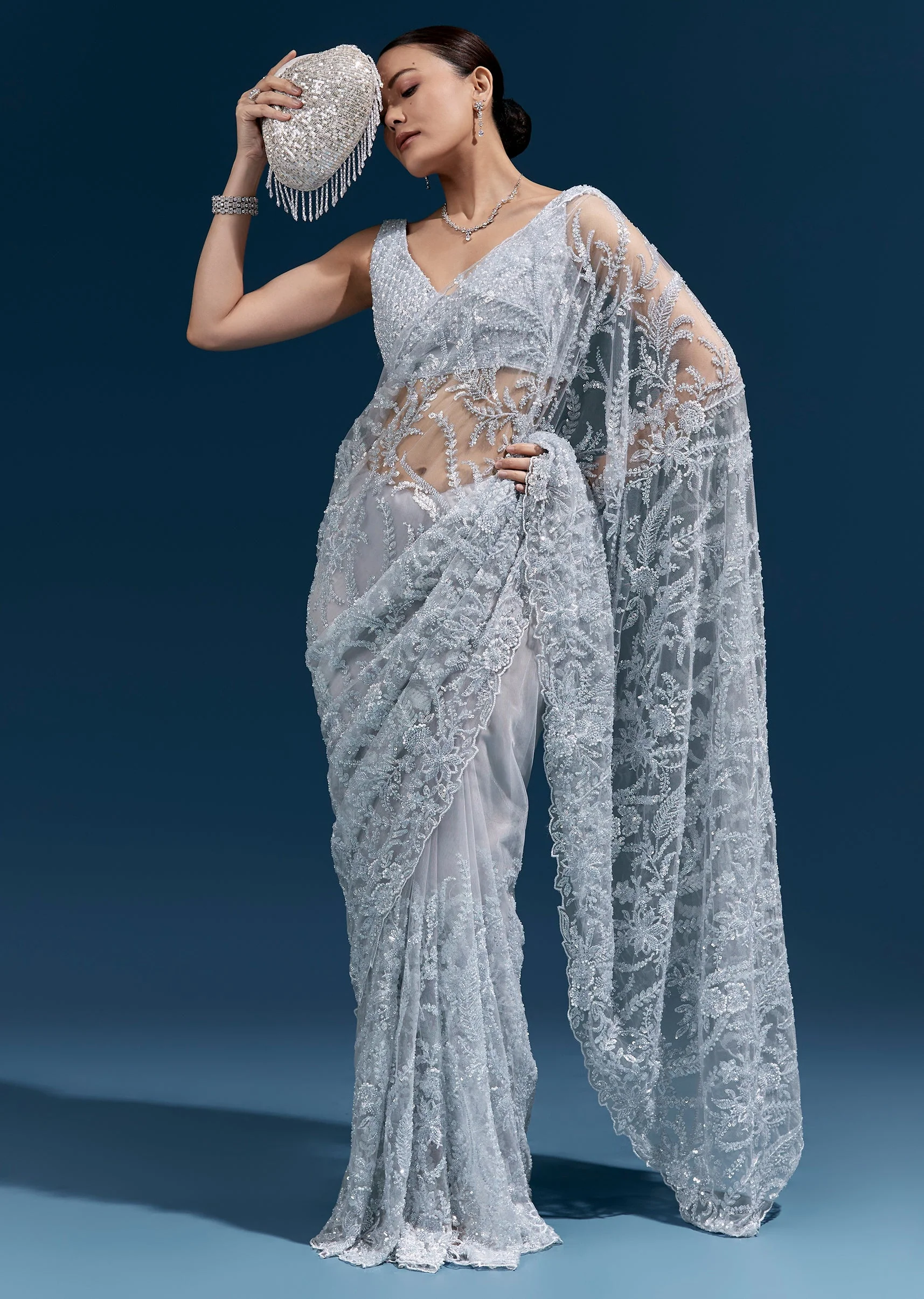 Ice Blue Heavy Embroidered Net Saree With Cutwork Border And All Over Floral Jaal