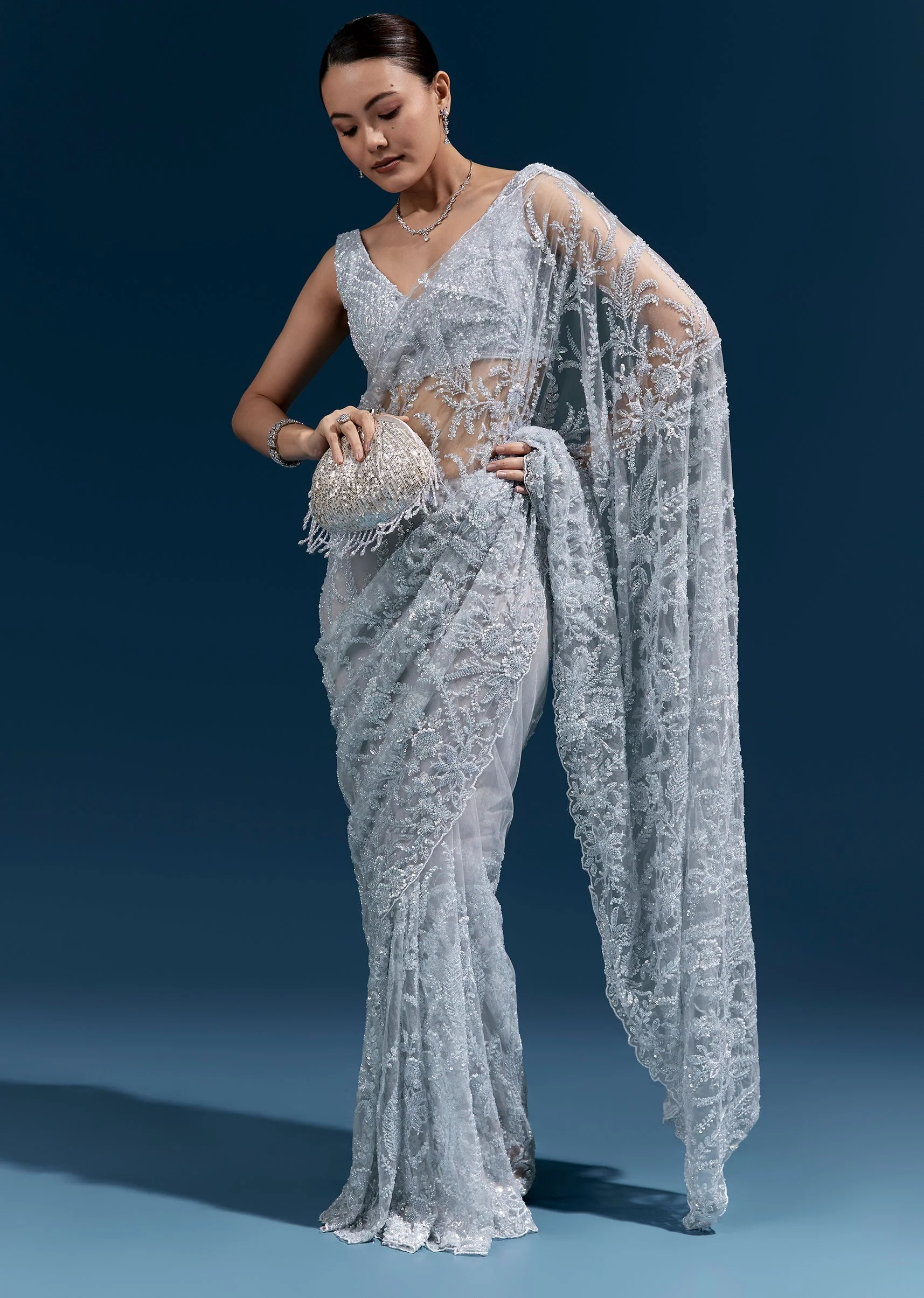 Ice Blue Heavy Embroidered Net Saree With Cutwork Border And All Over Floral Jaal - Image 3