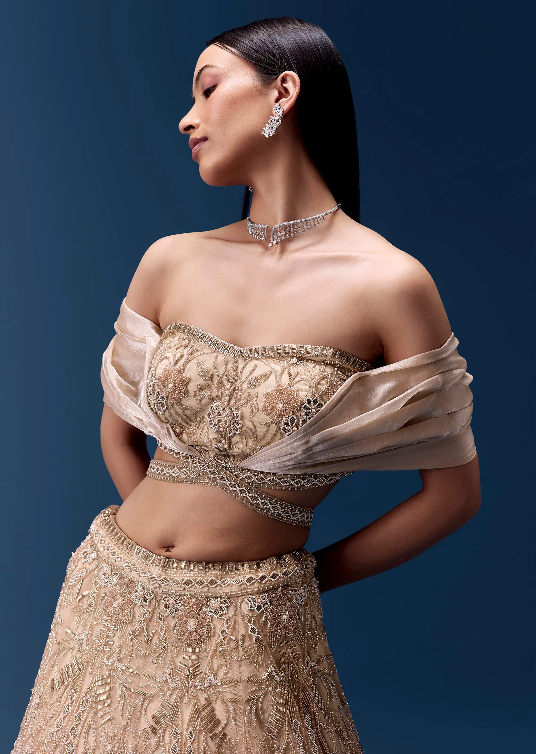 Ivory Off Shoulder Draped Blouse with Embellished Lehenga - Image 3
