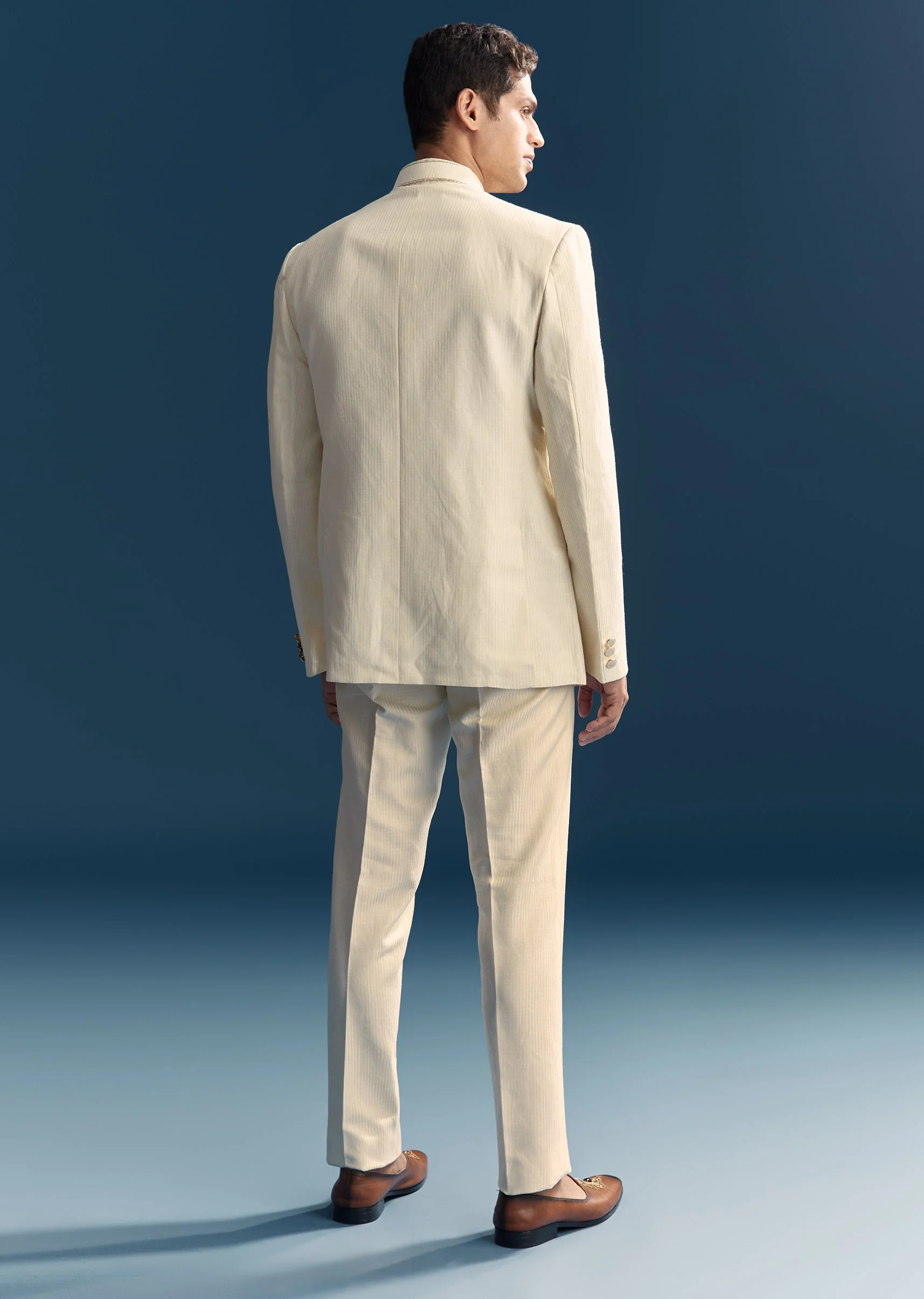Ivory Regal Duo – Embroidered Lehenga For Her And Jacquard Jodhpuri Suit For Him - Image 10
