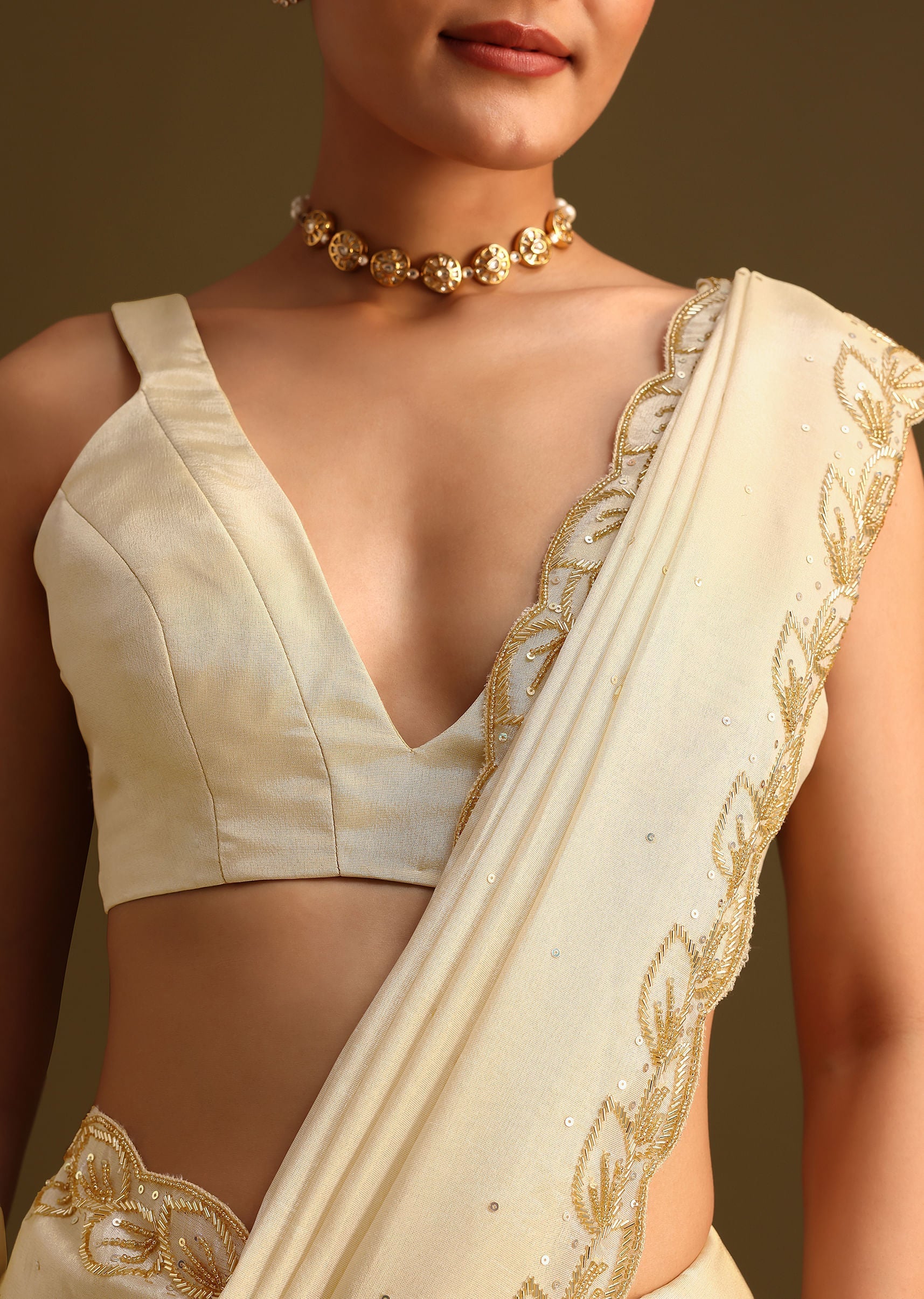 Ivory Tissue Saree With Cutdana Embroidered Border and Unstitched Blouse - Image 2