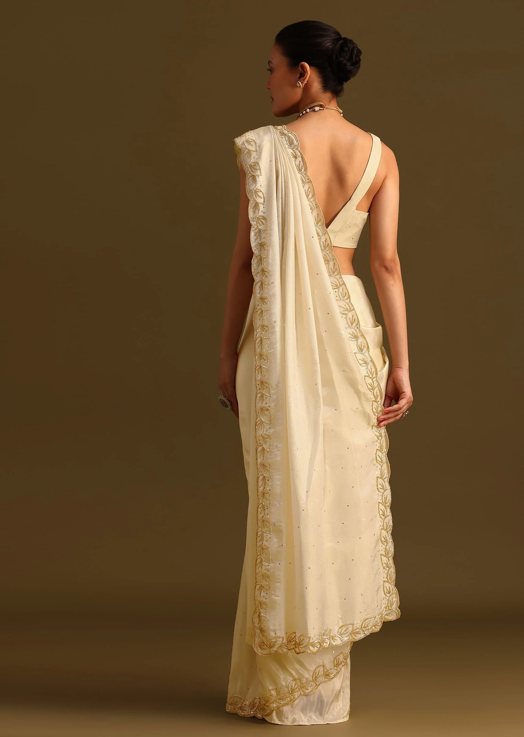 Ivory Tissue Saree With Cutdana Embroidered Border and Unstitched Blouse - Image 6