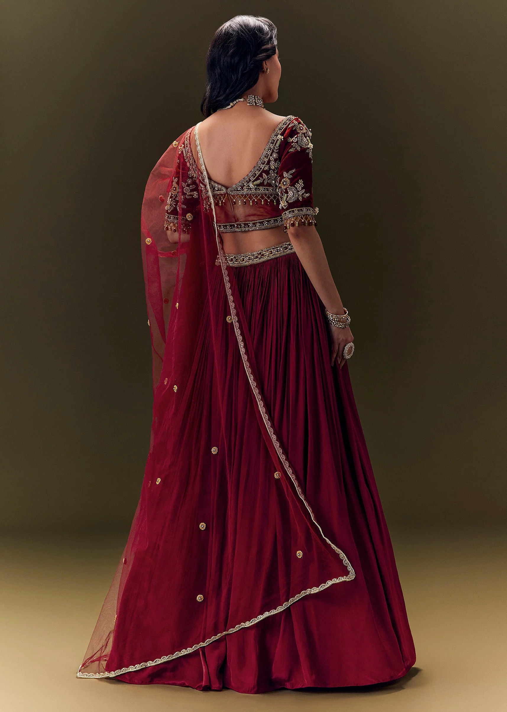 Maroon Pleated Skirt With Hand Embroidered Velvet Belt And Blouse With Net Dupatta - Image 6