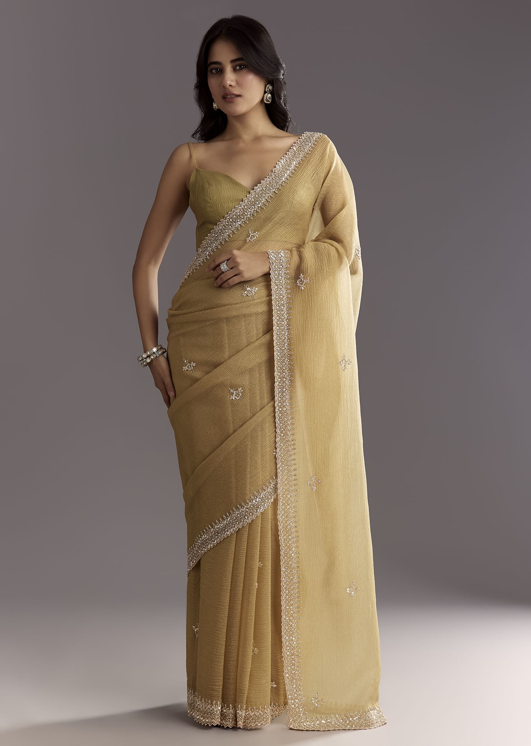 Mehendi Green Crushed Tissue Saree With Cutwork Embroidered Border