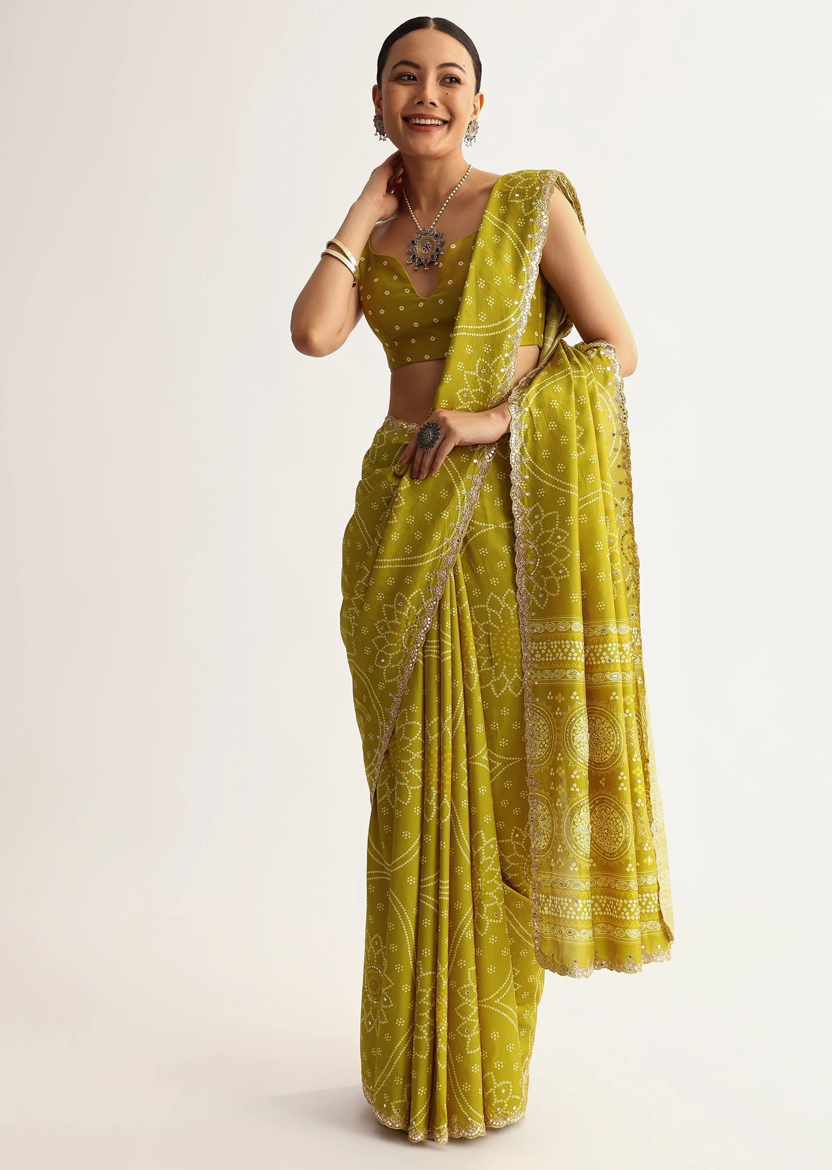 Mehendi Green Patola Printed Georgette Saree With Scallop Border - Image 10