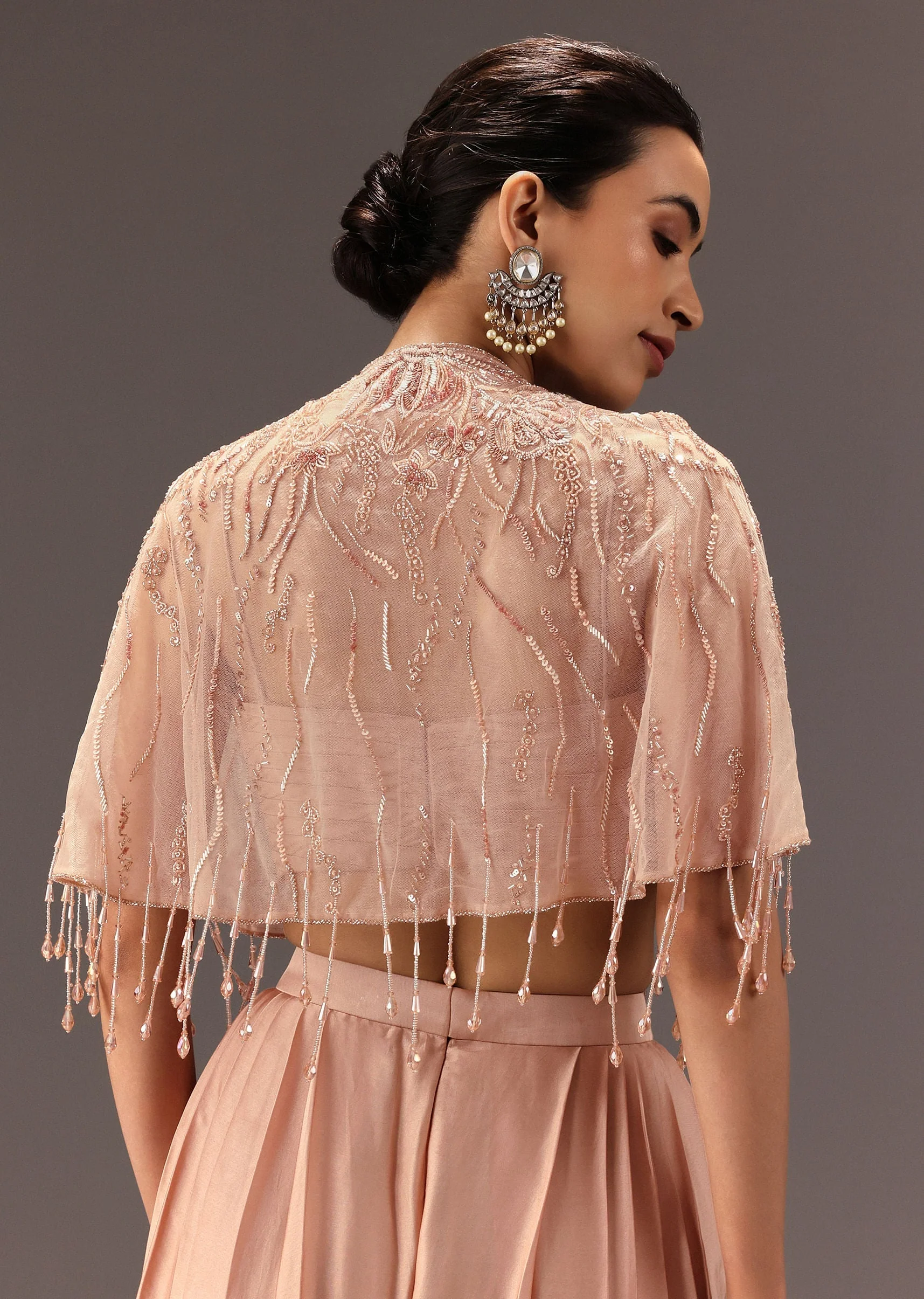 Nude Pleated Blouse With Tassel Cape And Dhoti Pants - Image 4