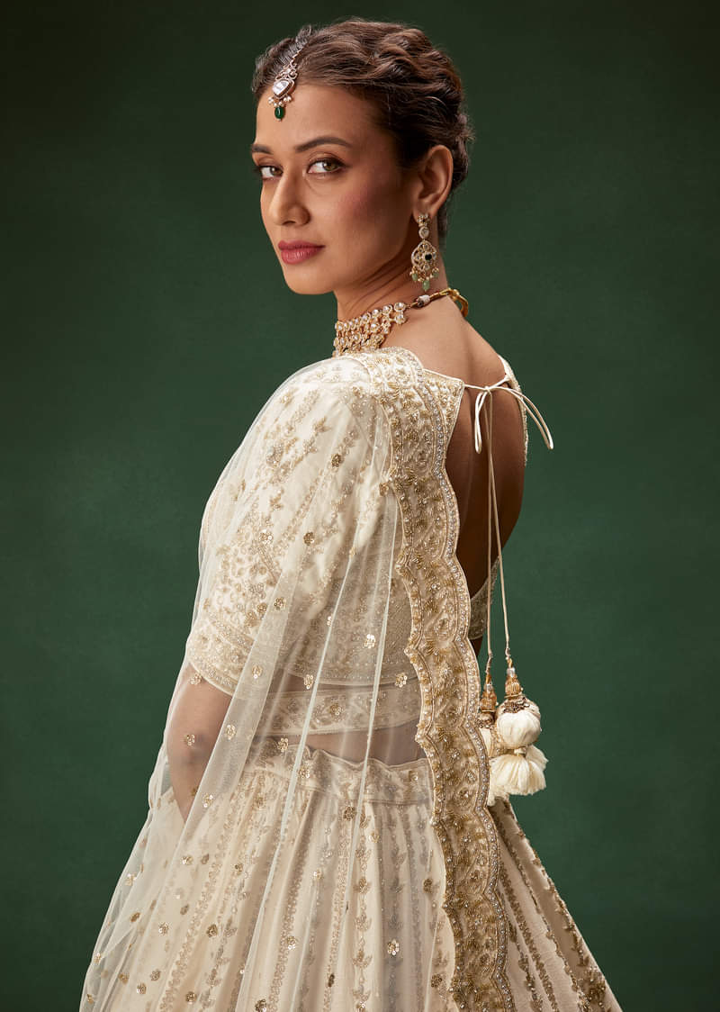 Off White Bridal Lehenga Set With Boat Neck Blouse And Regal Zari Work - Image 6