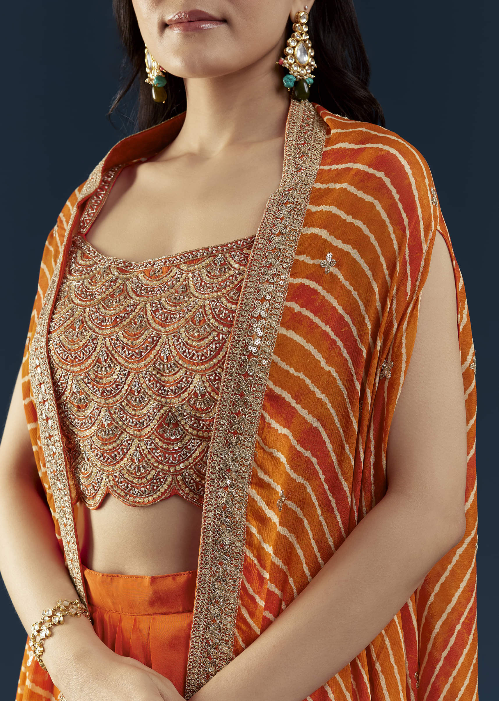 Orange Asymmetric Crop Top Skirt Set with Leheriya Cape - Image 2