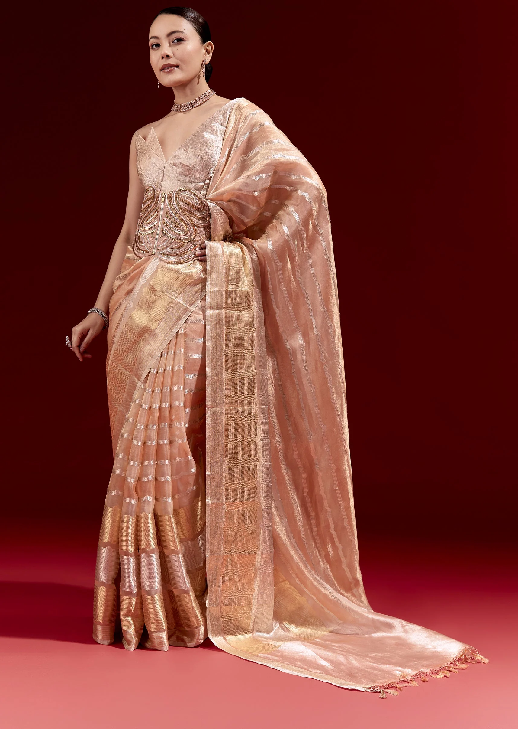 Peach Banarasi Tissue Saree With Chanderi Stripes And Embroidered Cutdana Belt