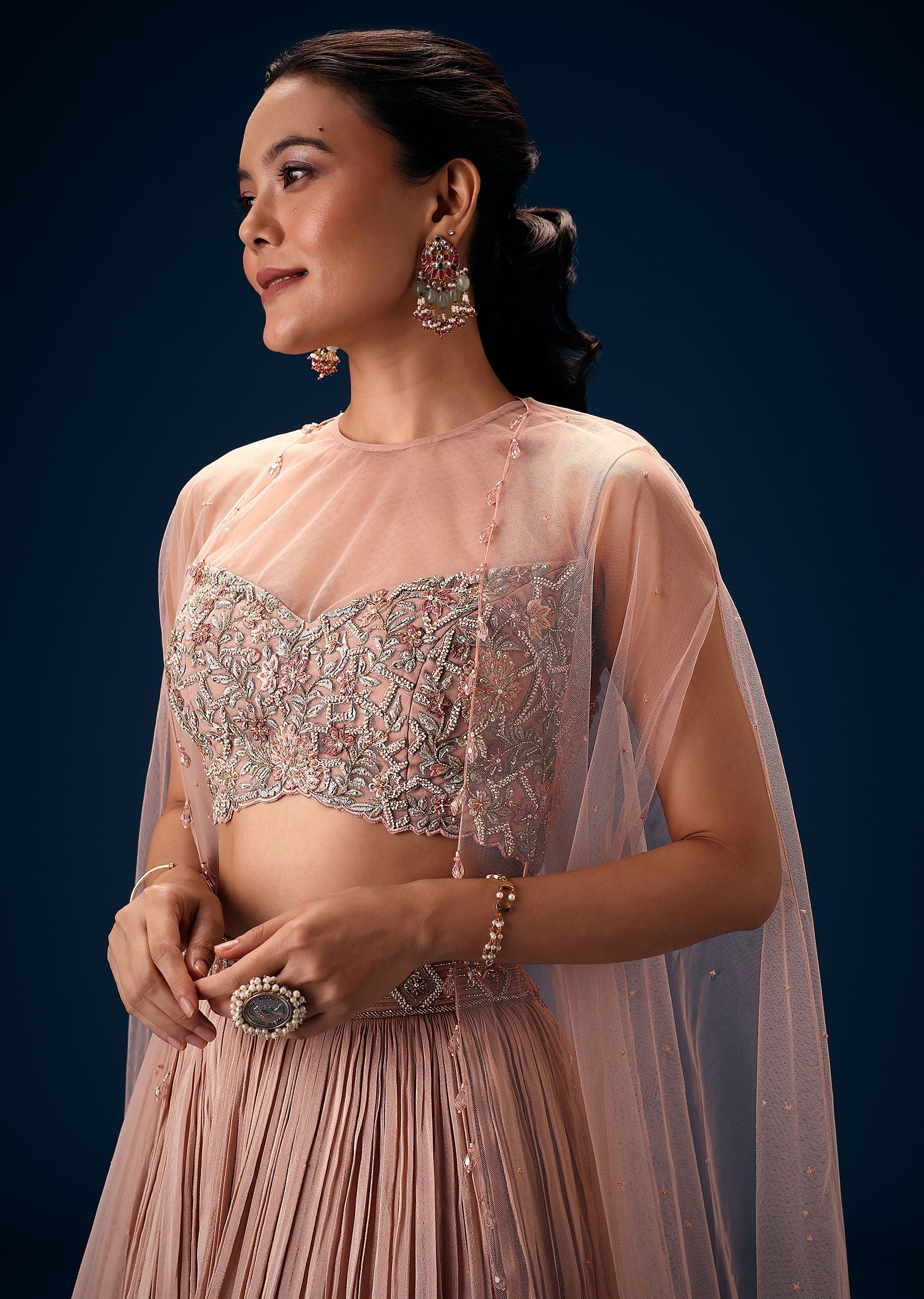 Peach Ruched Lehenga With Embroidered Blouse and Net Cape - Image 4