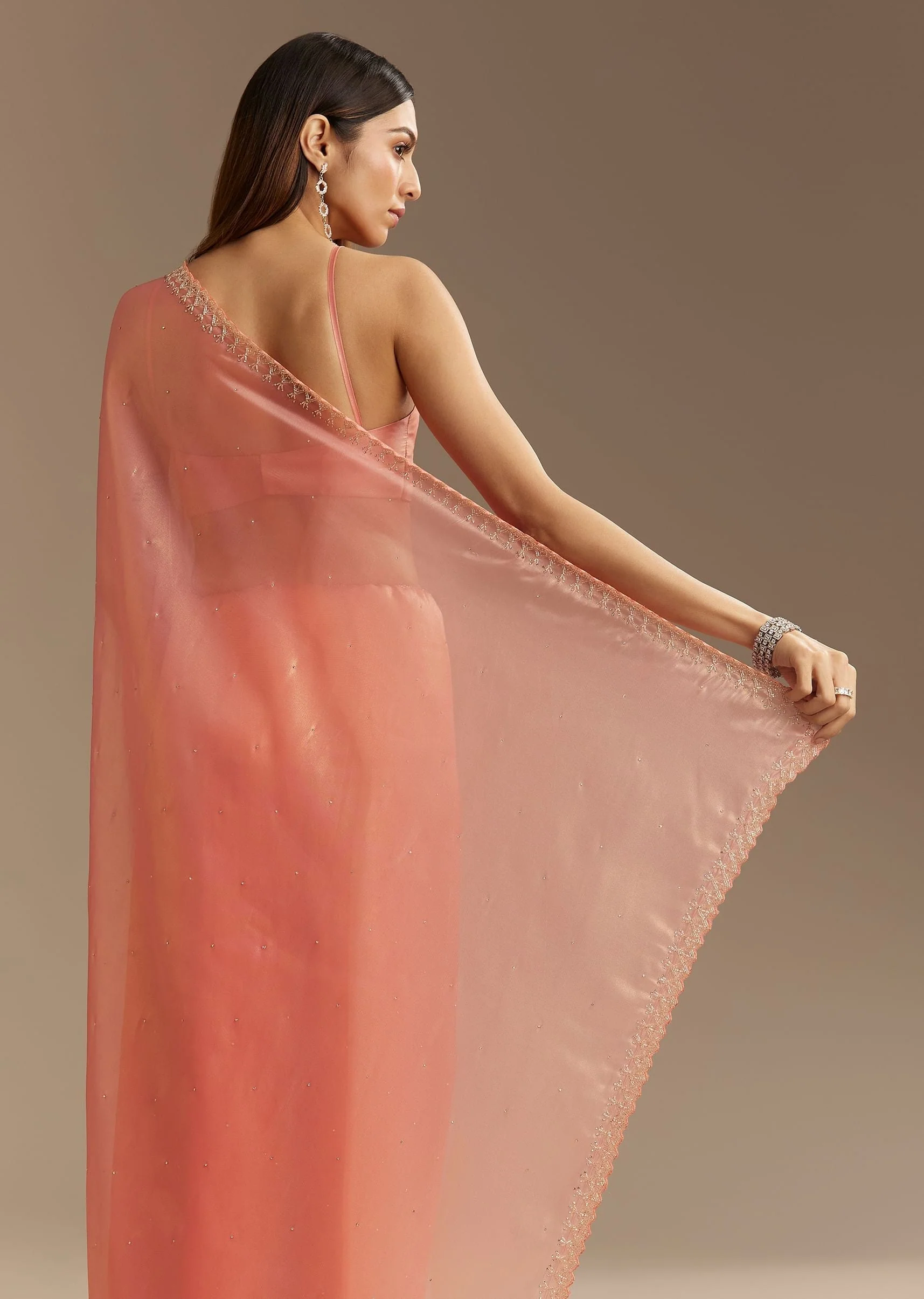 Peach Tissue Saree With Stones Cutdana Embellishments And Scallop Border - Image 4