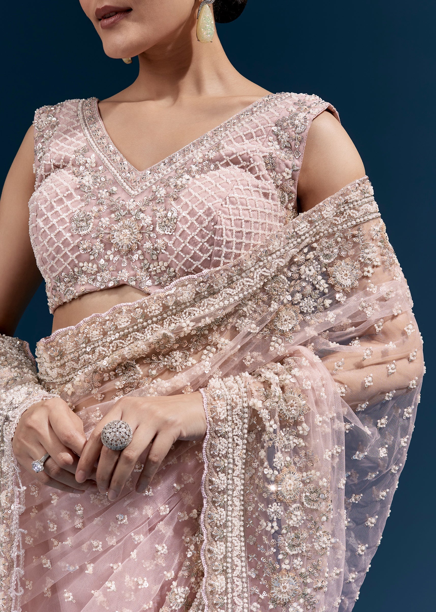 Pink Heavy Embroidered Net Saree With Scalloped Border And Tasselled Pallu - Image 2