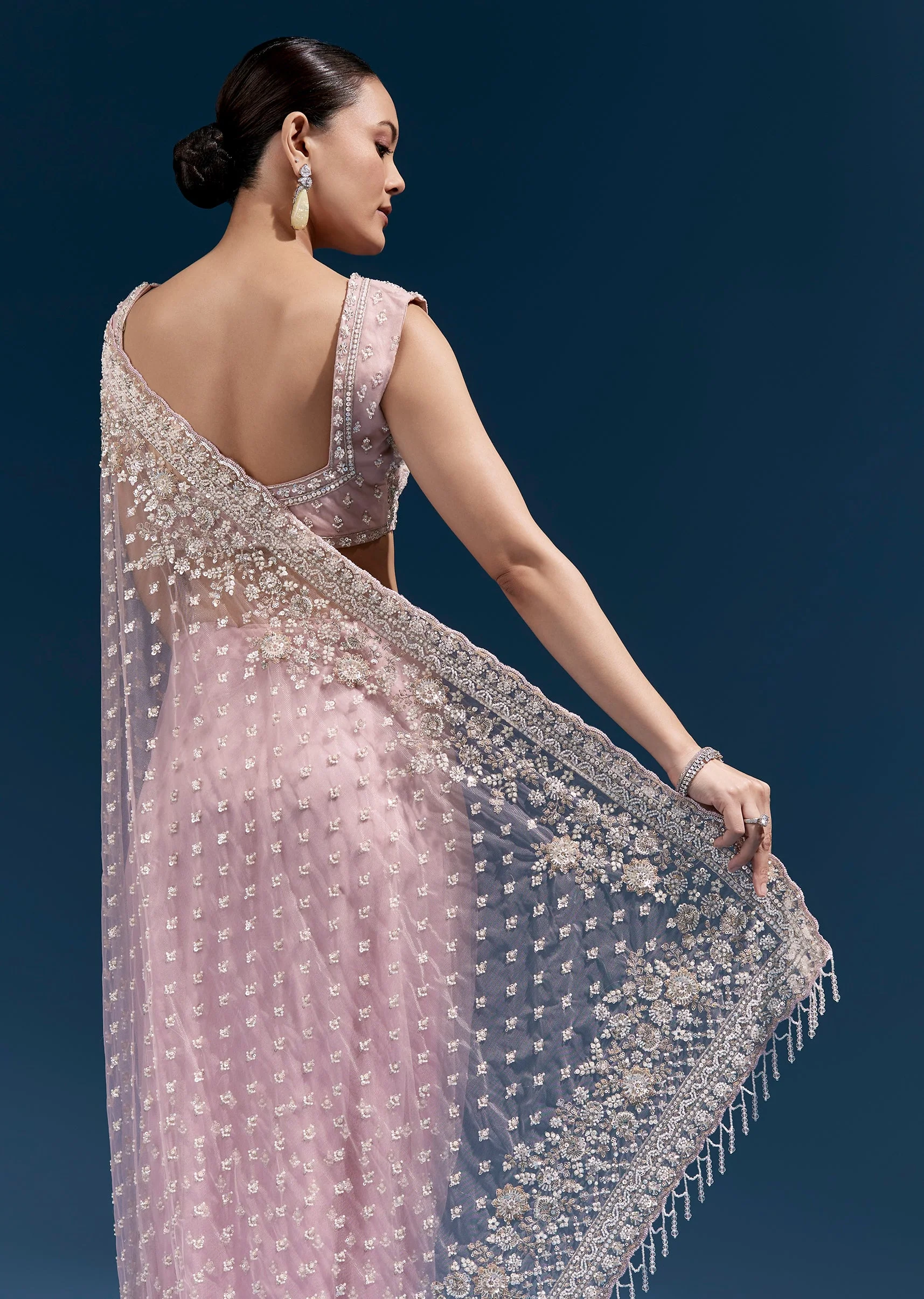 Pink Heavy Embroidered Net Saree With Scalloped Border And Tasselled Pallu - Image 6