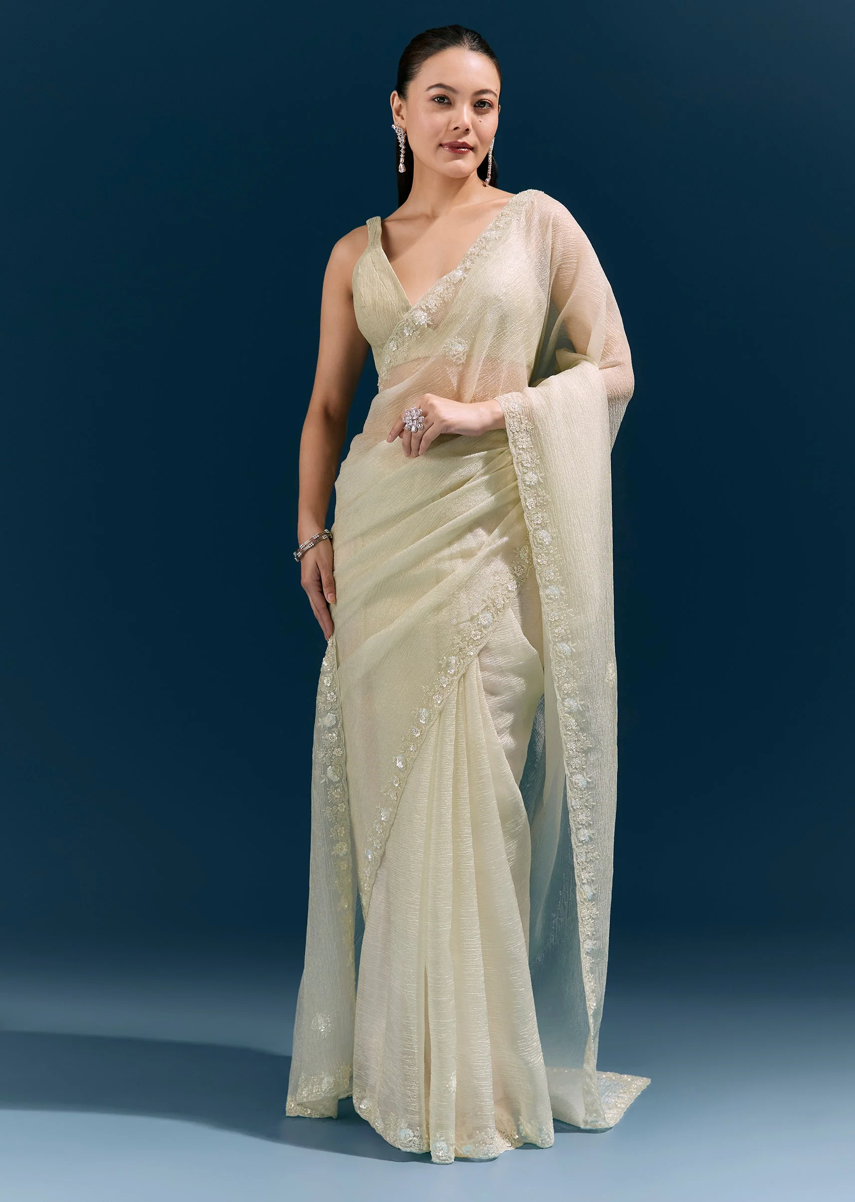 Pista Green Crush Tissue Saree With Hand Embroidered Cutda Border And Butti