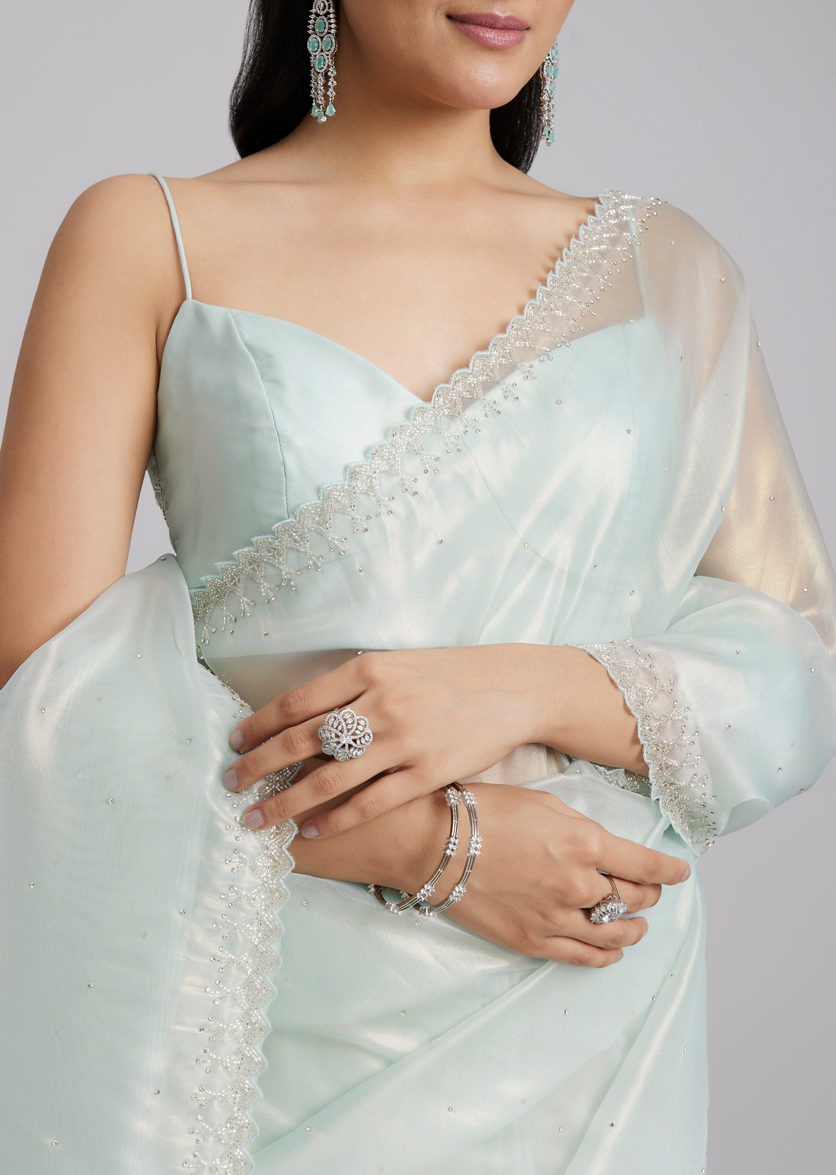 Powder Blue Tissue Saree With Stones And Zigzag Border - Image 2