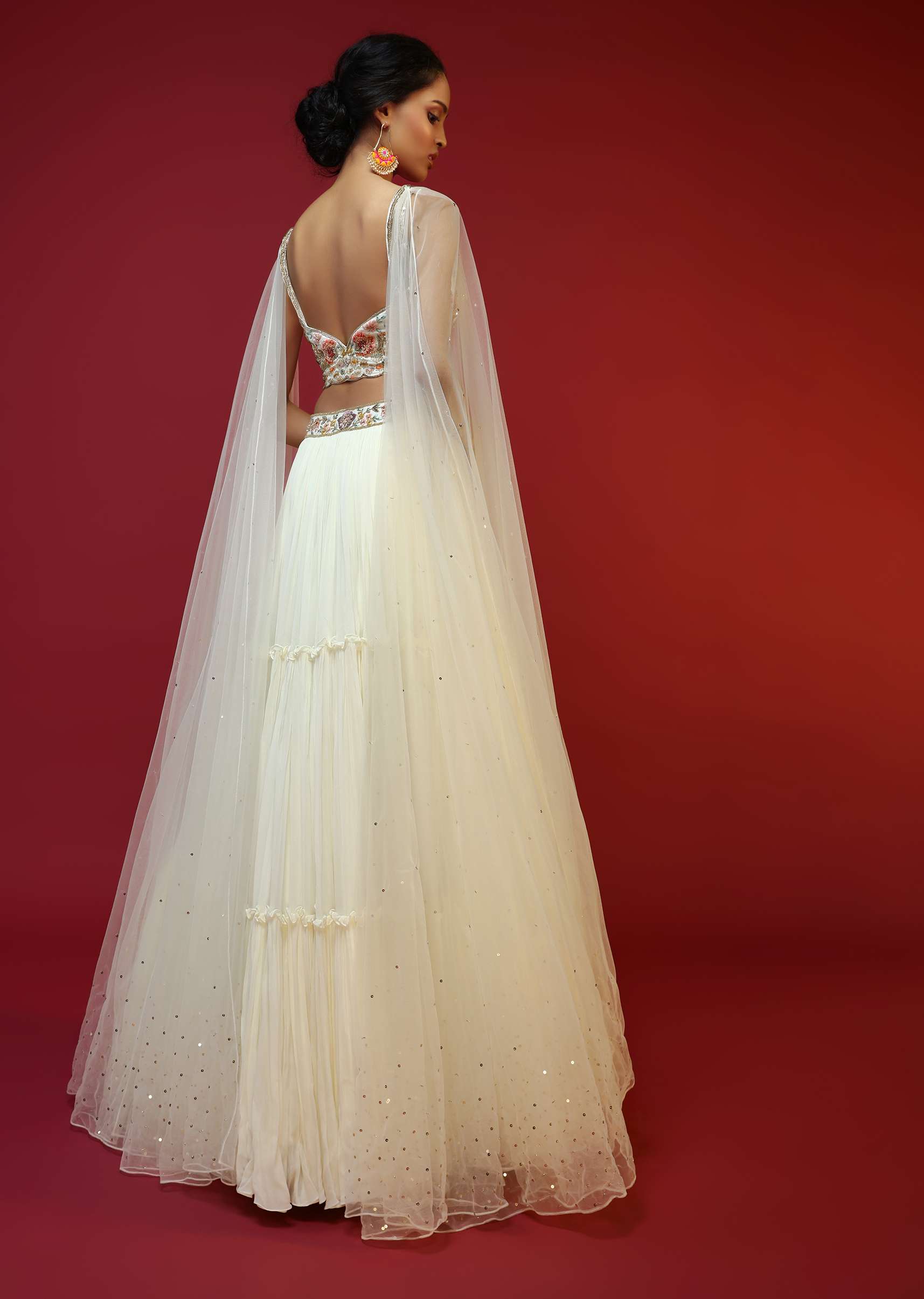 Powder White Lehenga Choli With Attached Cape And Hand Embroidery Using Colorful Resham And Sequins In Floral Motifs - Image 4