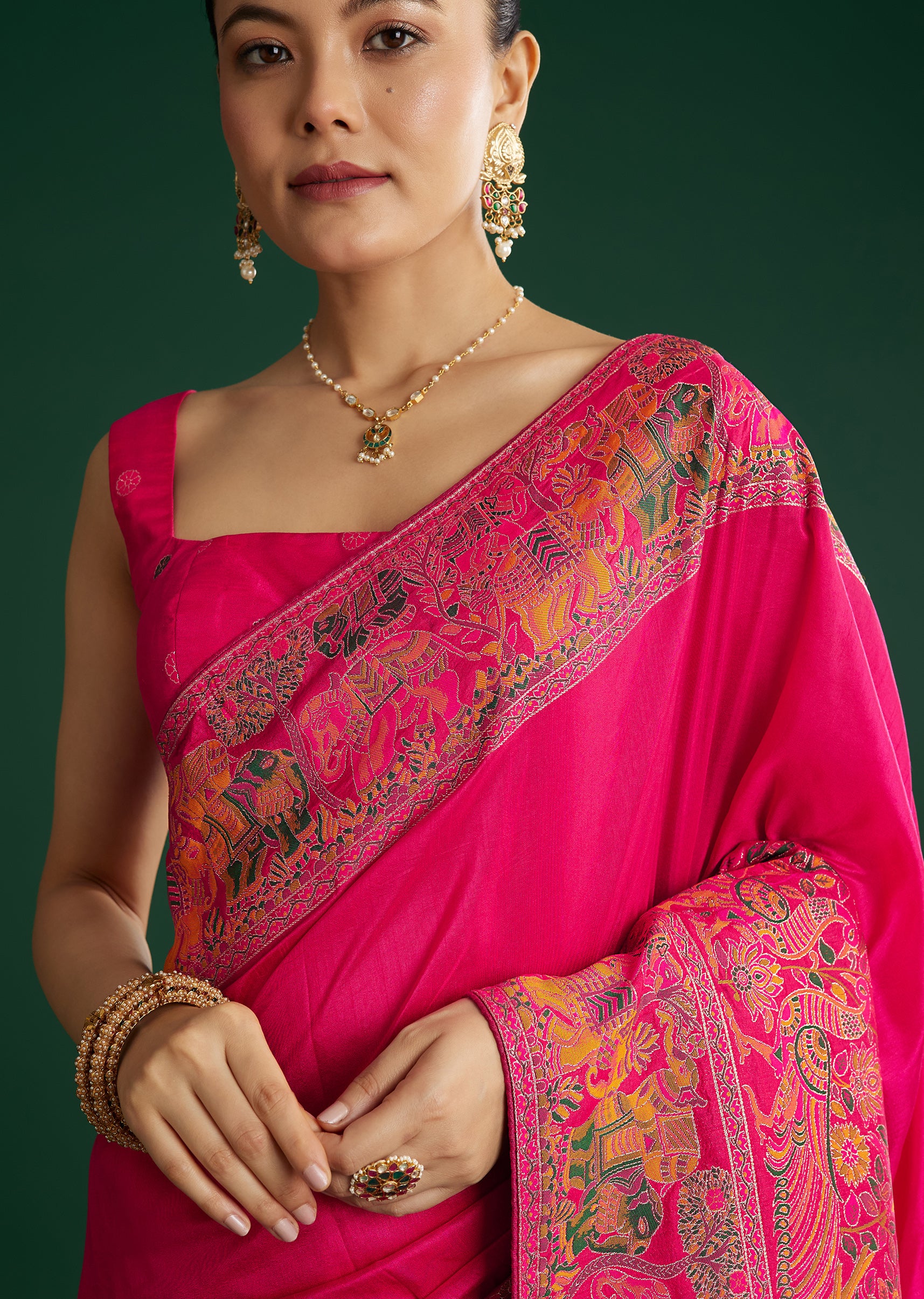 Rani Pink Dola Silk Woven Saree With Floral And Animal Prints - Image 2